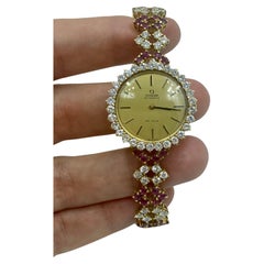 1980s 18k gold Omega watch adorned with diamonds and rubies
