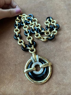 1980s 18K Gold Onyx and Diamond Convertible Necklace and Brooch