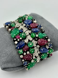 1980s 18k gold Tutti Frutti bracelet with carved emeralds, sapphires, rubies