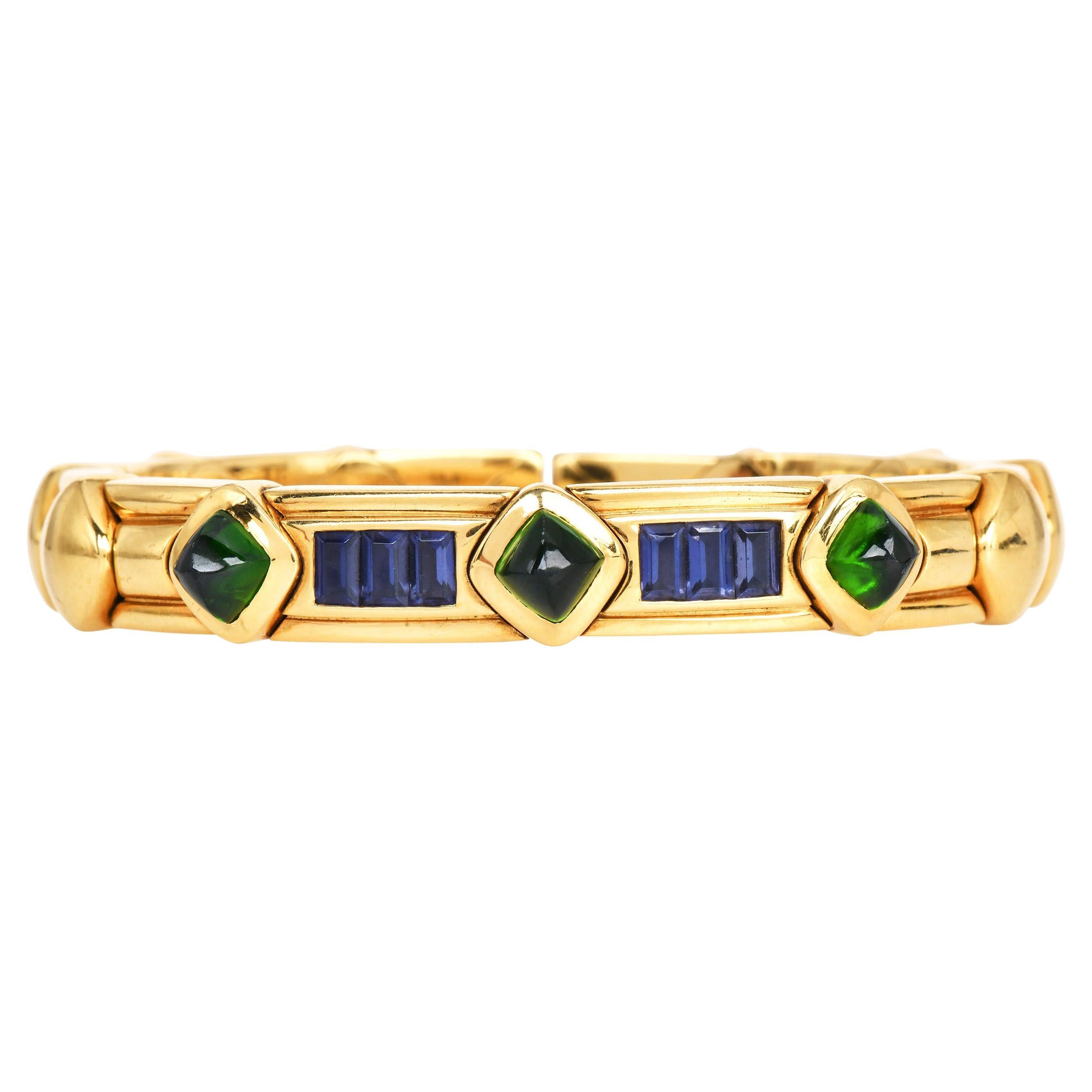 Bracciale anni 
80 in oro giallo verde 18 carati con tormalina e tanzanite in vendita