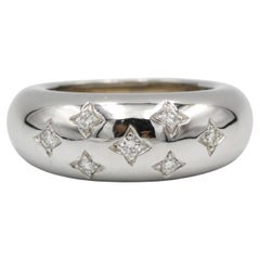 1980s 18K White Gold Band Ring with Star-Set Diamonds