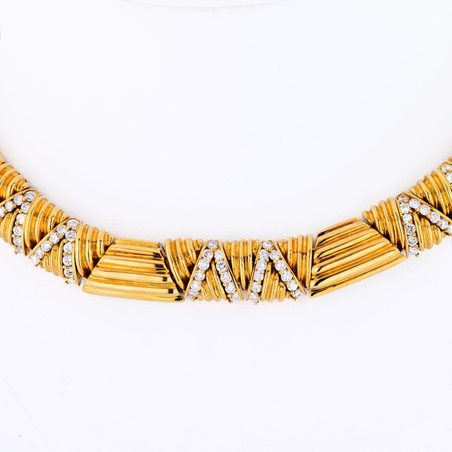 Crafted in 1980's made in 18k yellow gold this substantial rigid gold choker necklace is just lightly encrusted with round cut diamonds for a little glitz. Other than that it's a beautiful dome feel statement jewelry piece that can be worn alone or