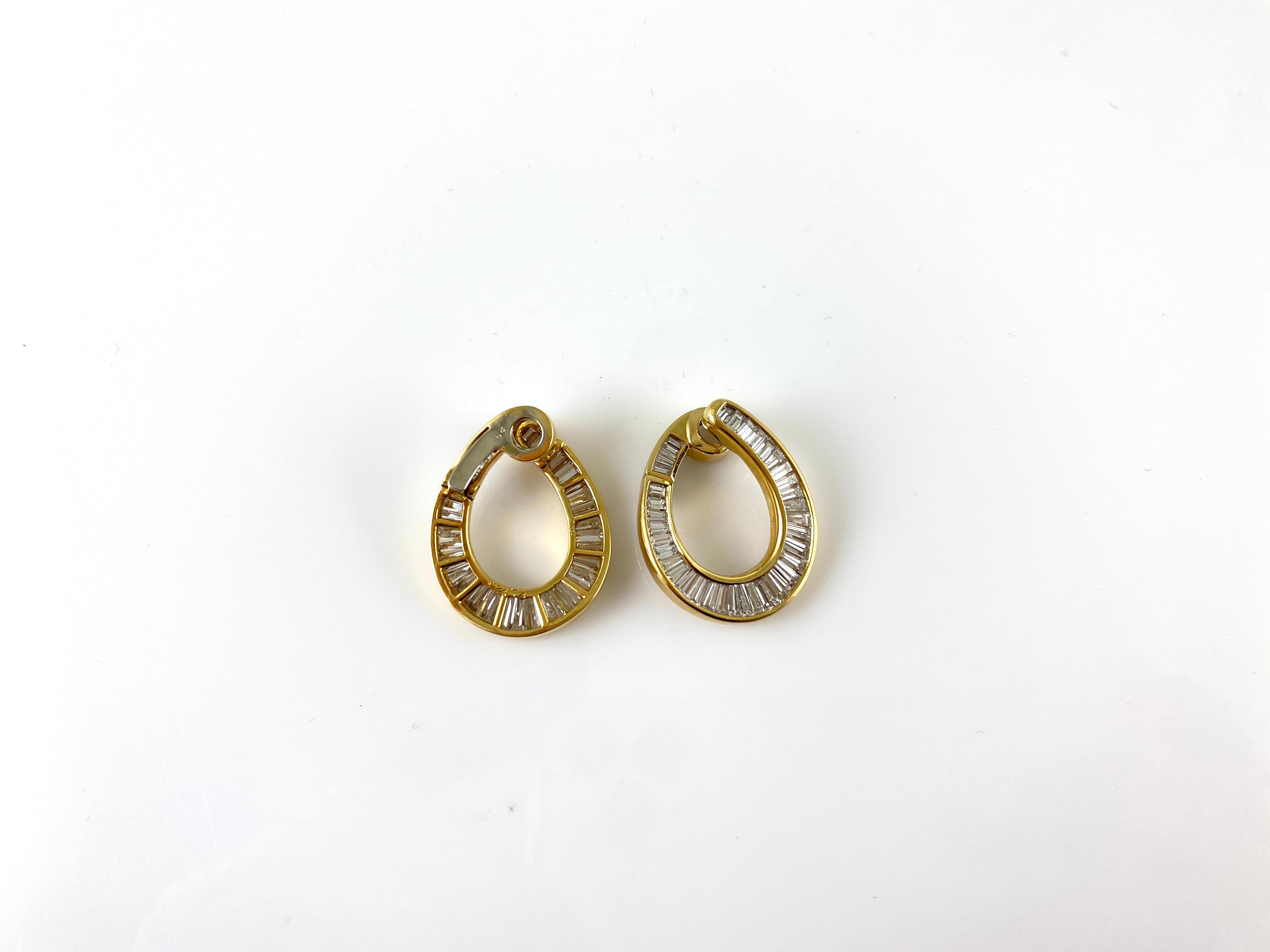 The earrings are finely crafted in 18k yellow gold with emerald cut diamonds weighing approximately total of 5.00 carat.
Circa 1980.