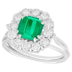 1980s, 1.94 Carat Emerald and Diamond White Gold Cluster Engagement Ring