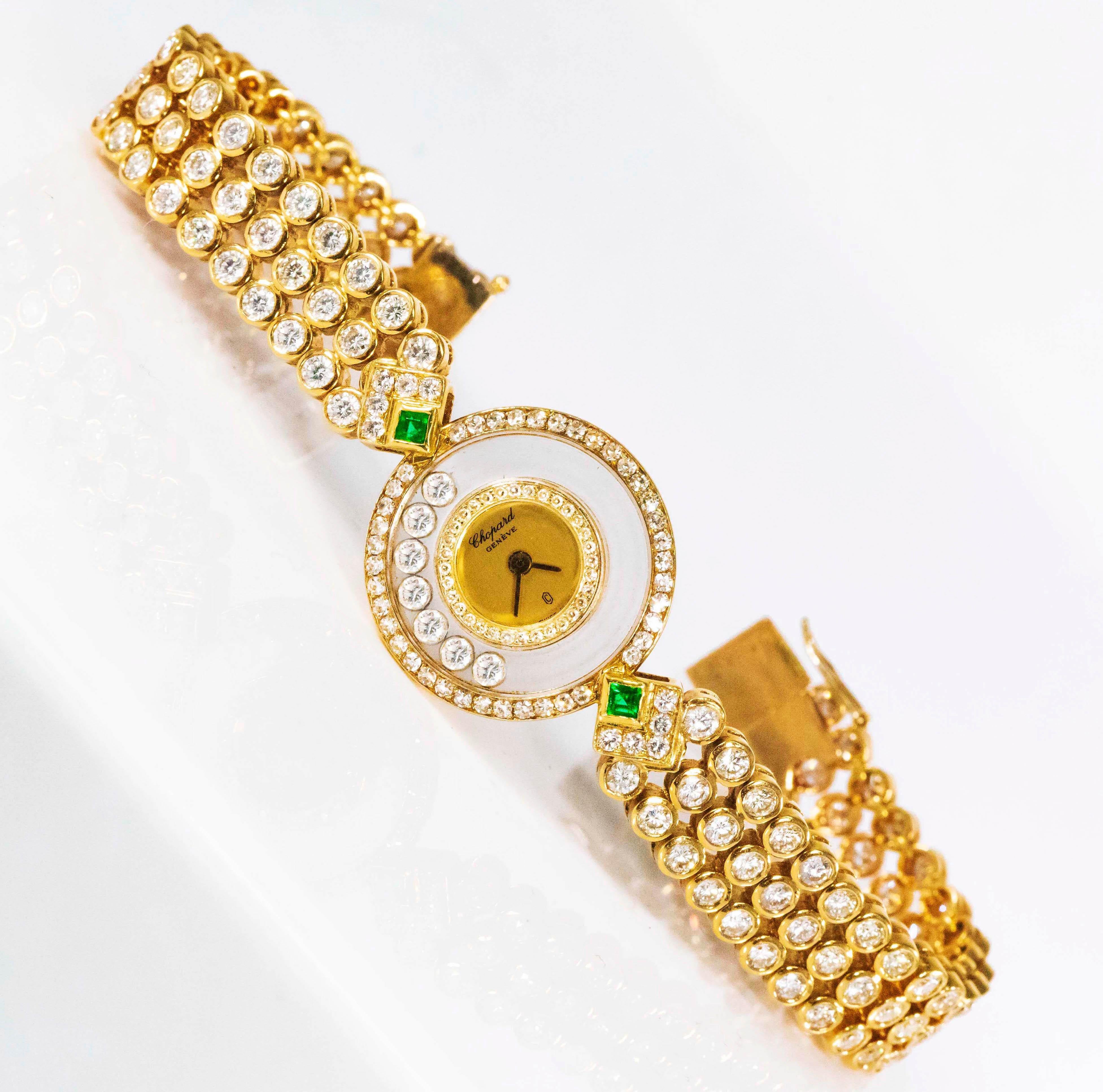FRESH TO THE MARKET - A Very Rare Possibly Piece Unique, Special design 1980s 18kt Chopard Triple Diamond Row & Emerald Set “Happy Diamond” Bracelet Watch
 - With 175 round cut diamonds totaling approximately 14 carats (original retail approximately