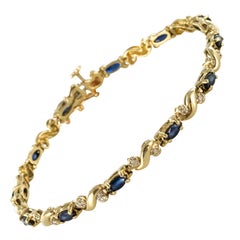 1980s 2 Carat Sapphire Diamonds Yellow Gold Line Bracelet