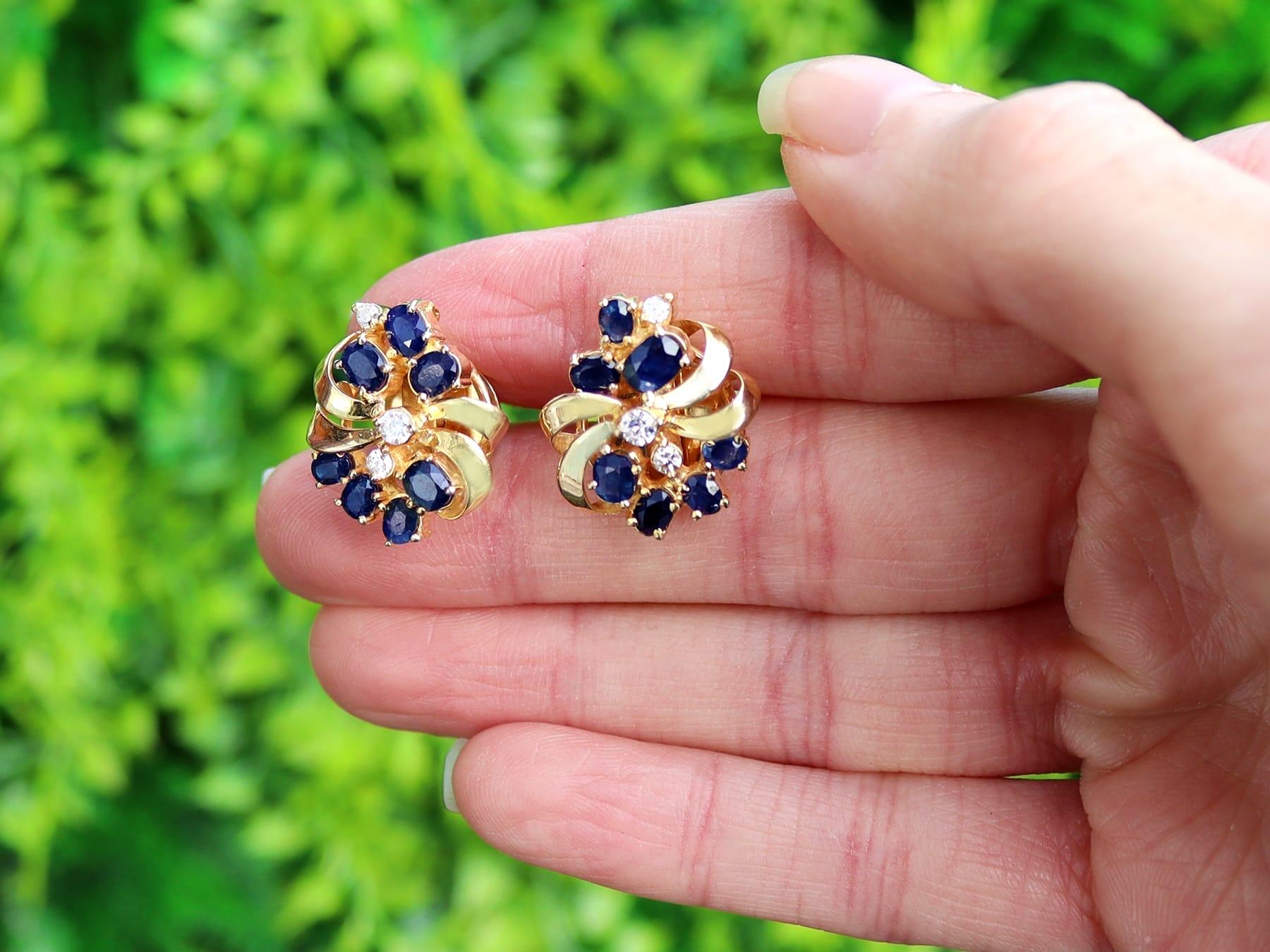 An impressive pair of vintage 2.25 carat sapphire and 0.26 carat diamond, 14 karat yellow gold stud earrings; part of our diverse vintage jewelry and estate jewelry collections.

These fine and impressive vintage sapphire earrings have been crafted