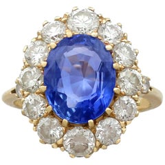 1980s 4.10 Carat Ceylon Sapphire 1.75 Carat Diamond Gold Dress Ring