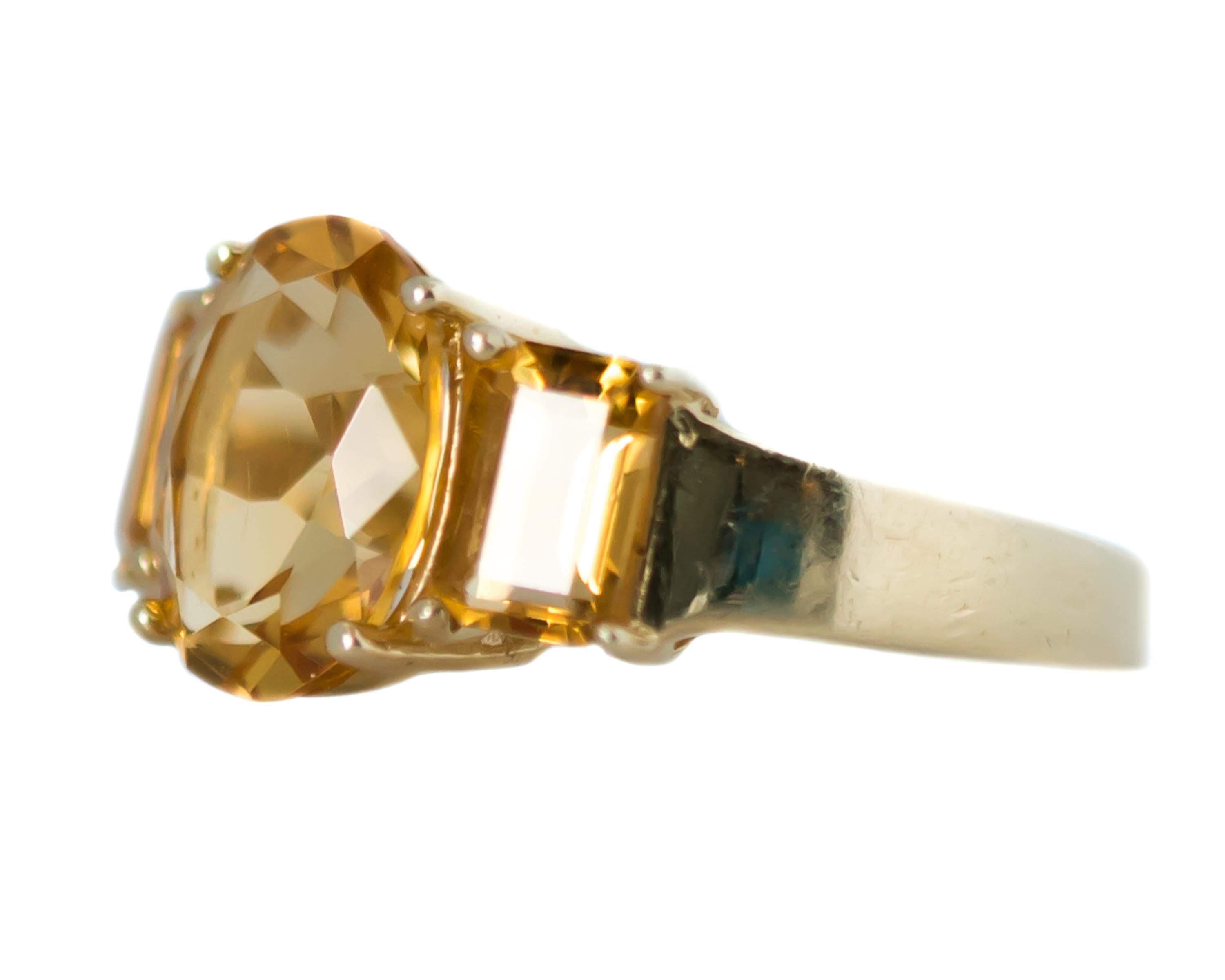Women's 1980s 4.9 Carat Total Citrine and 14 Karat Yellow Gold Three-Stone Ring For Sale