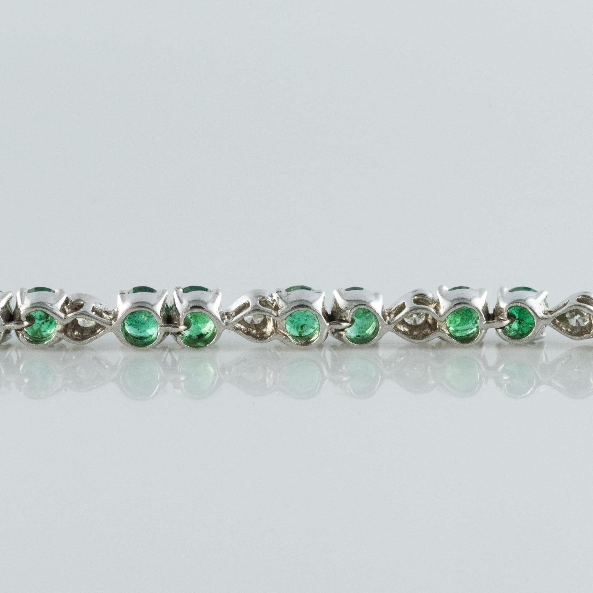 1980s 5.90 Carat Emerald Diamond Silver Tennis Bracelet 5