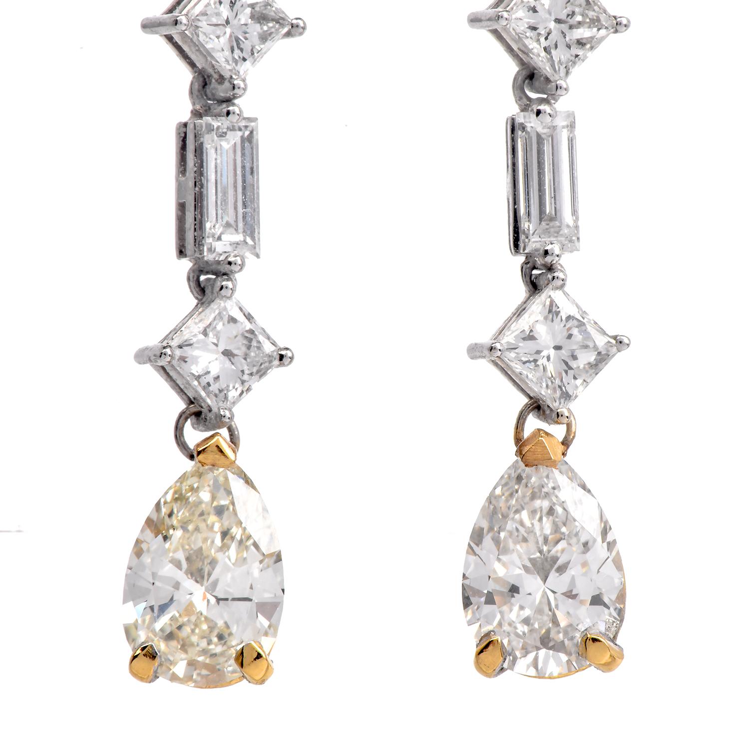 These stylish 18K gold long drop earrings are designed with an elegant linear drop that alternates between baguette and square-cut diamonds, culminating in a beautiful pear-cut diamond drop.

The diamonds are natural with exceptional brilliance,