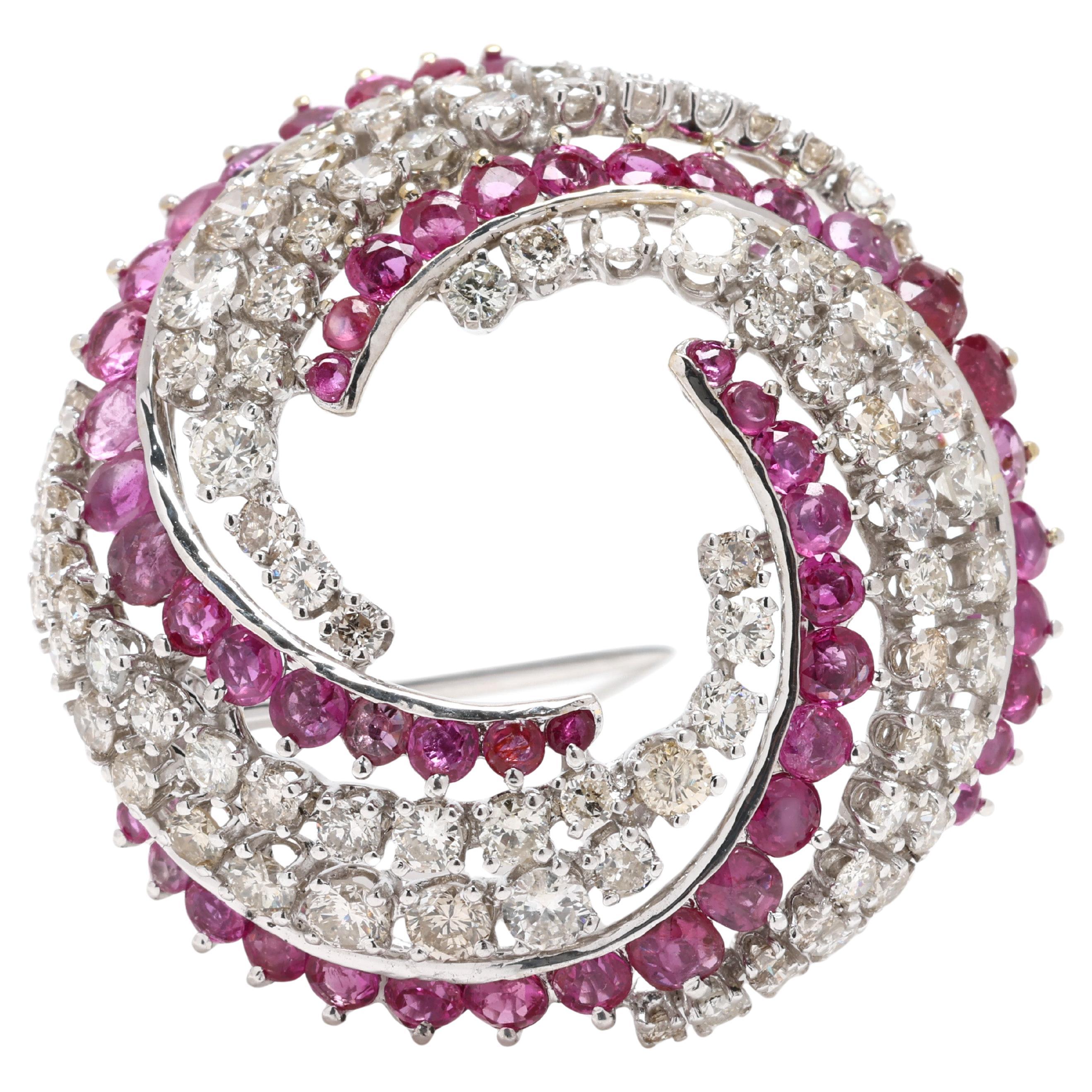1980s 6.1ctw Ruby and Diamond Swirl Brooch, 14k White Gold, Length 1.25 Inches