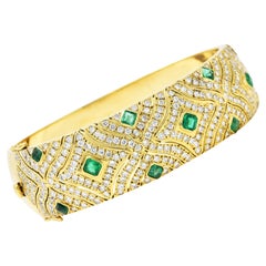 Bracelet jonc vintage percé en or jaune 18 carats avec diamants et émeraude de 8,50 carats, années 1980