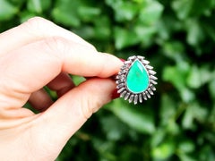 1980s 8.82 Carat Emerald and 1.58 Carat Diamond White Gold Cocktail Ring