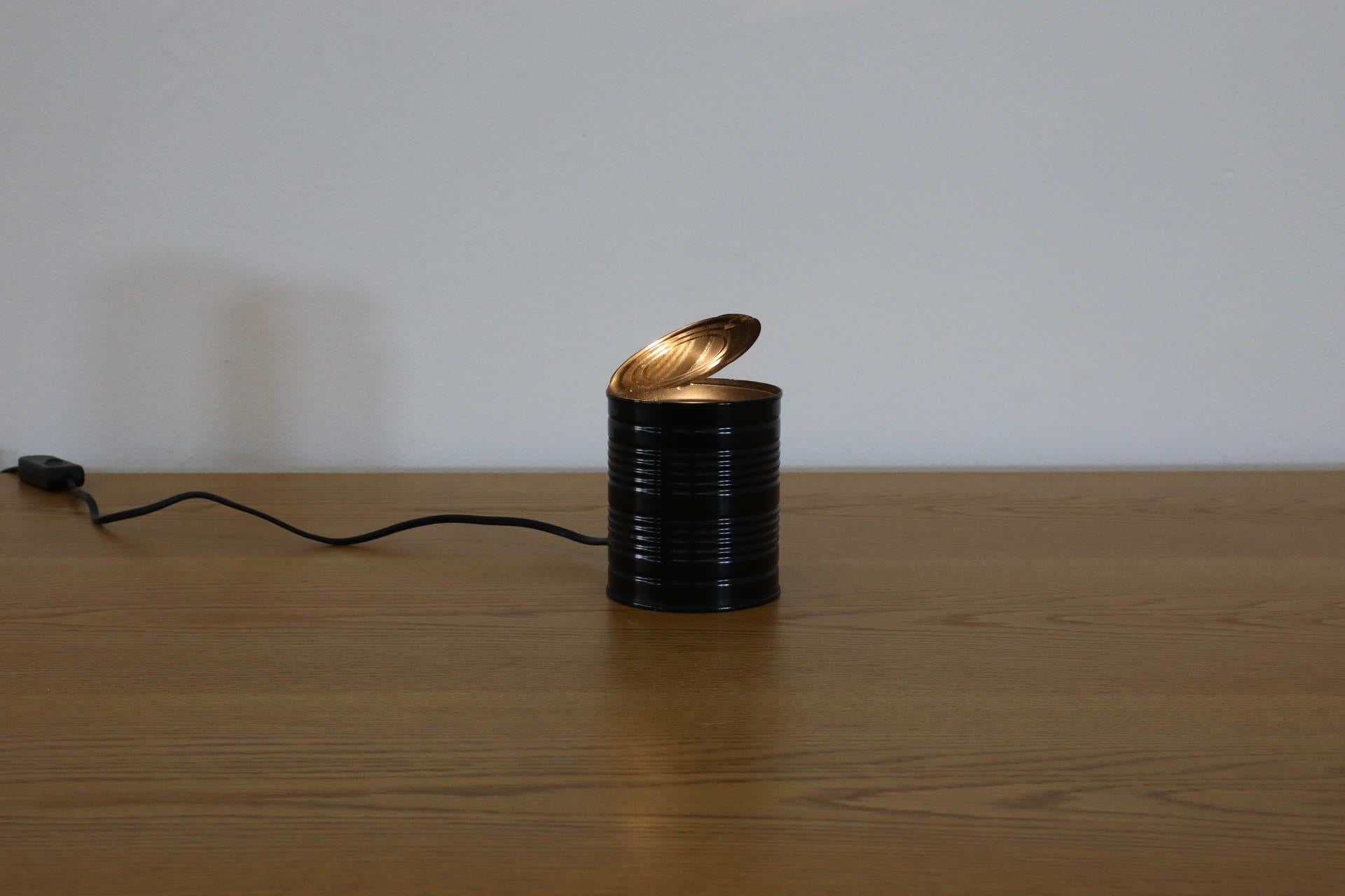 Dutch, 1980s Pop Art, black tin can lamp. Designed by Ad van Berlo for Vrieland Design. Vrieland Design, active from the late 1970s to the 1990s, created numerous lamps and Ad van Berlo served as the main designer. This wittily conceptualized light