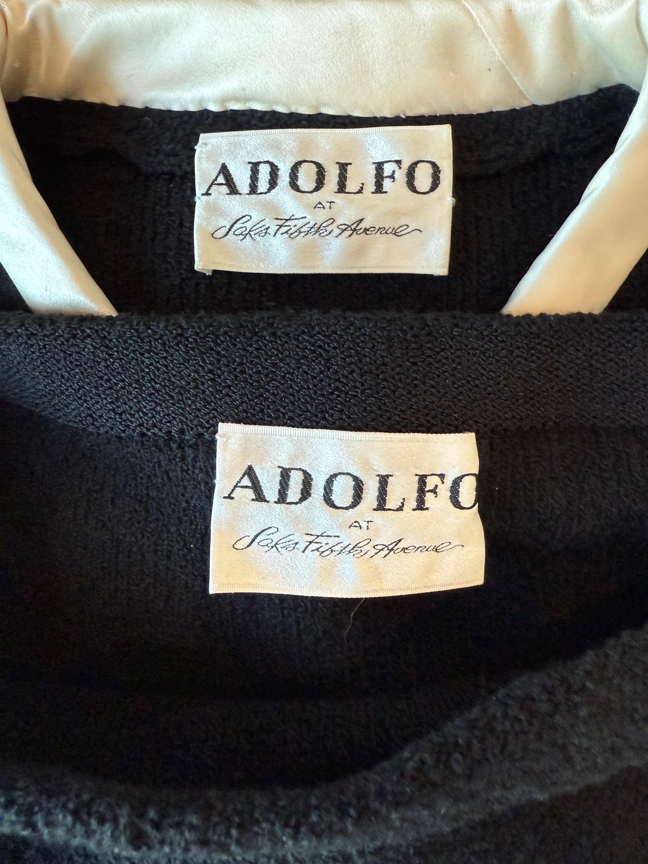 Chic early 80s Adolfo for Saks 5th Ave black and white / ivory knit skirt suit ! Features a tailored jacket with hidden snaps up the front where the bows are. Skirt simply slips on with an elastic waistband. Both pieces great together, or as