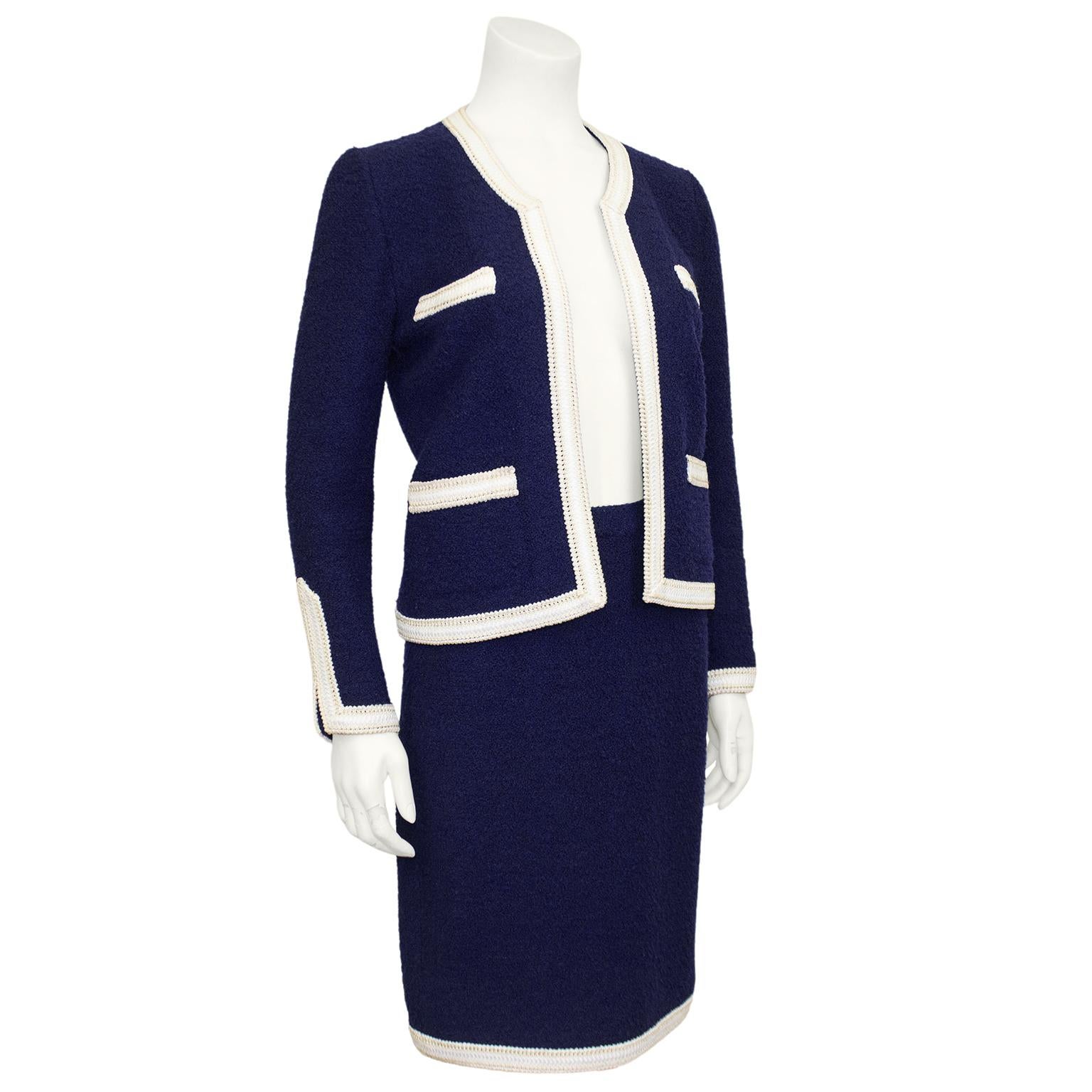 Lovely Adolfo wool knit skirt suit from the 1980s. Navy blue with 1