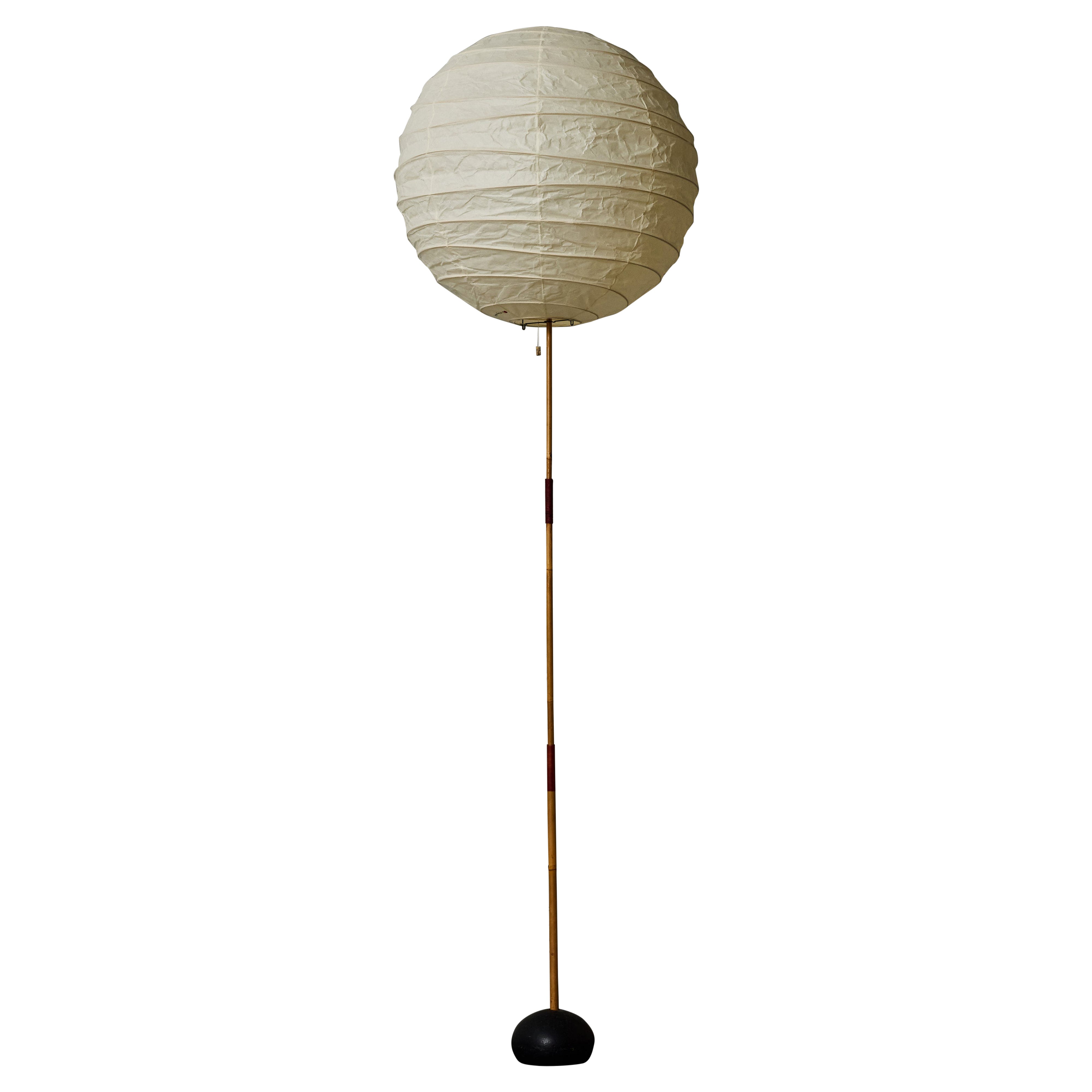 How do I assemble a Noguchi paper lantern floor lamp?