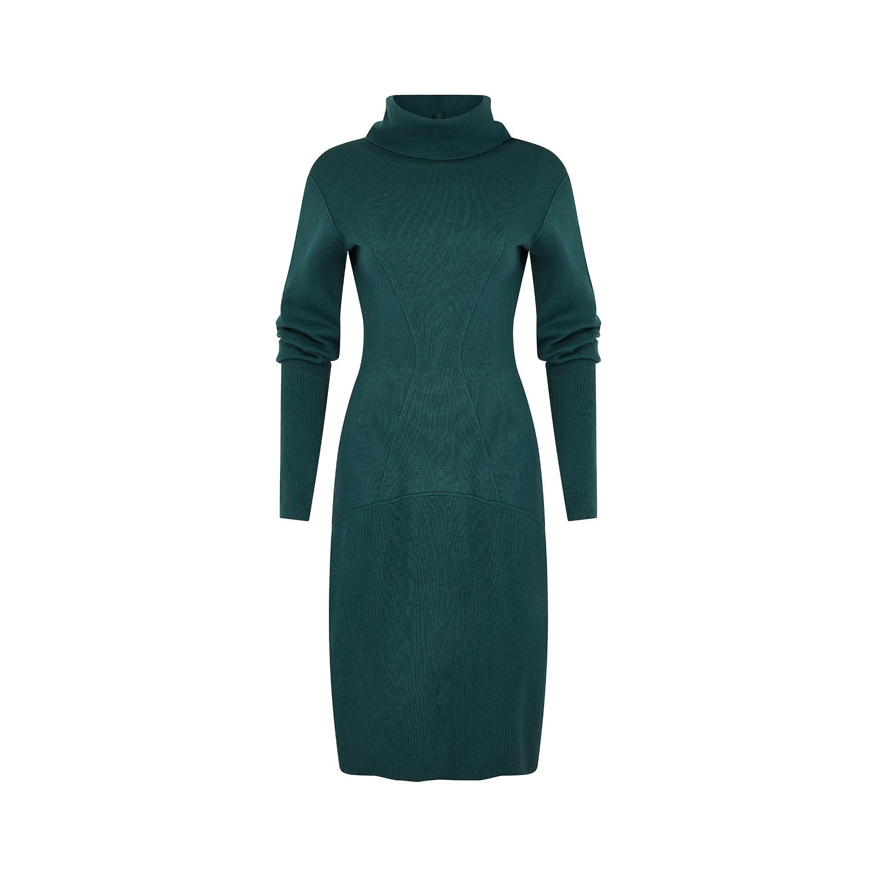 Runway documented knitted bodycon dress by Azzadine Alaia, in a deep teal green shade.  A great example of the bodycon and seamed, fitted designs which became the brand's signature. The material is a medium thick wool, with tapered seams which