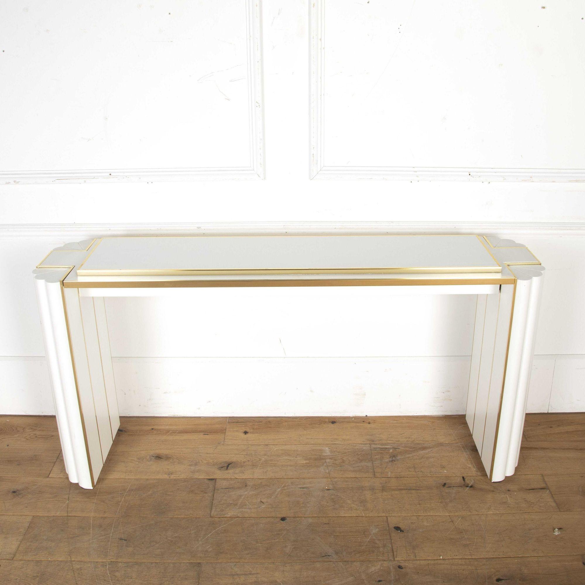 French 1980’s extra-wide modern console table by Alain Delon.
Signed by artist.
Alain Delon is known for his roles in such films as The Leopard and Le Samourai, however, in the 1970s Delon brought his sense of style to the world of furniture