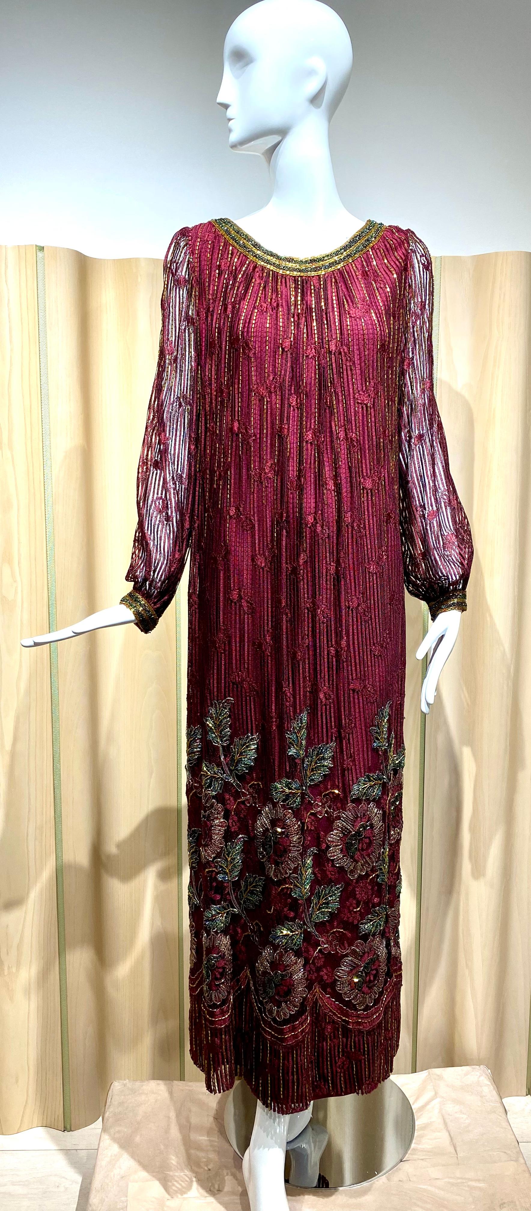 80s Alfred Bosand Burgundy red maxi long sleeve gown with embroidery.
Size: Medium
Bust: 38” / Waist: 36” / Hip: 42” / Dress length 54” / Sleeve length: 25”