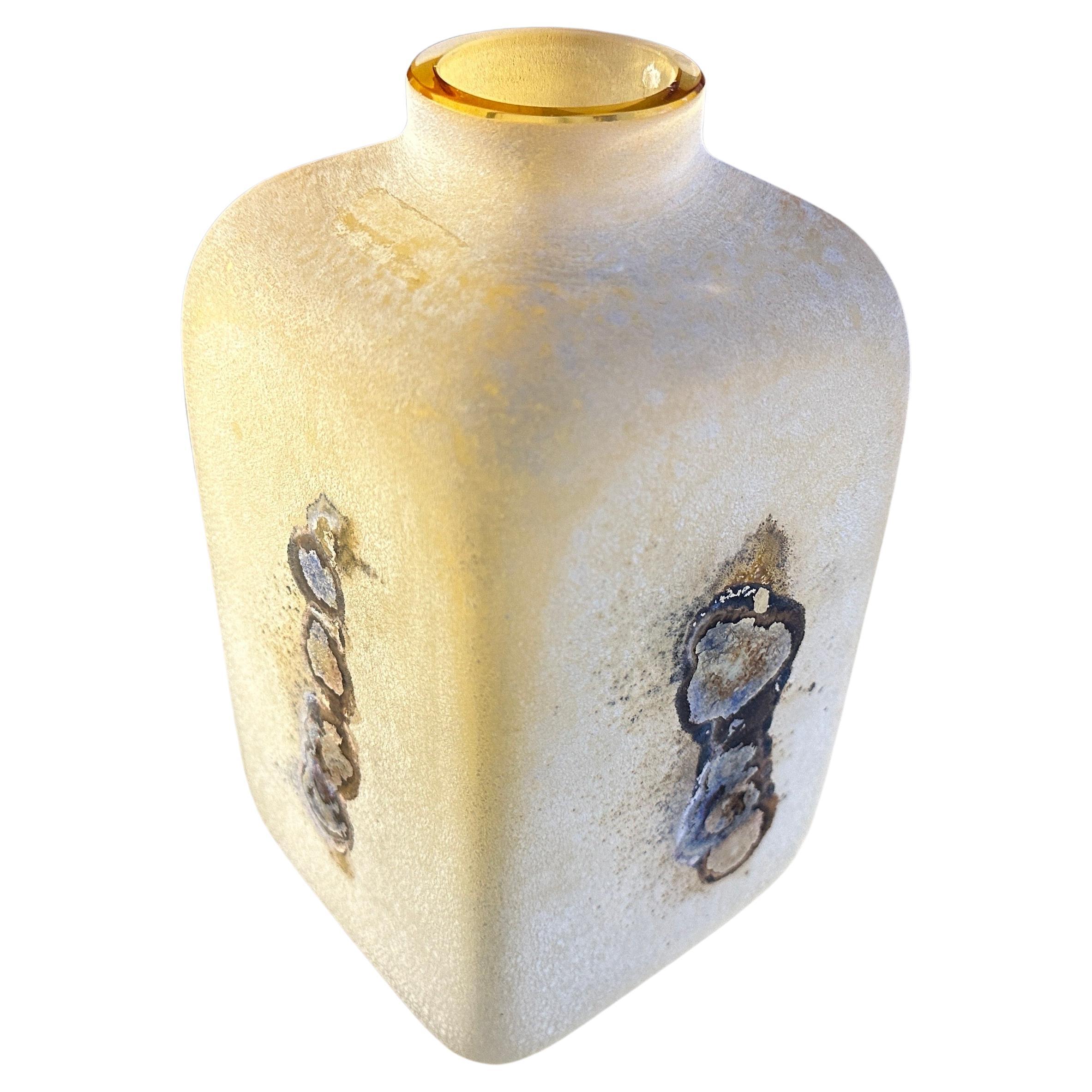 This Modernist Yellow Scavo Murano Glass Bottle by Alfredo Barbini is a stunning example of contemporary glass artistry, marrying innovation with tradition in the renowned Murano glassmaking tradition. It's also can reused as a vase and it's in