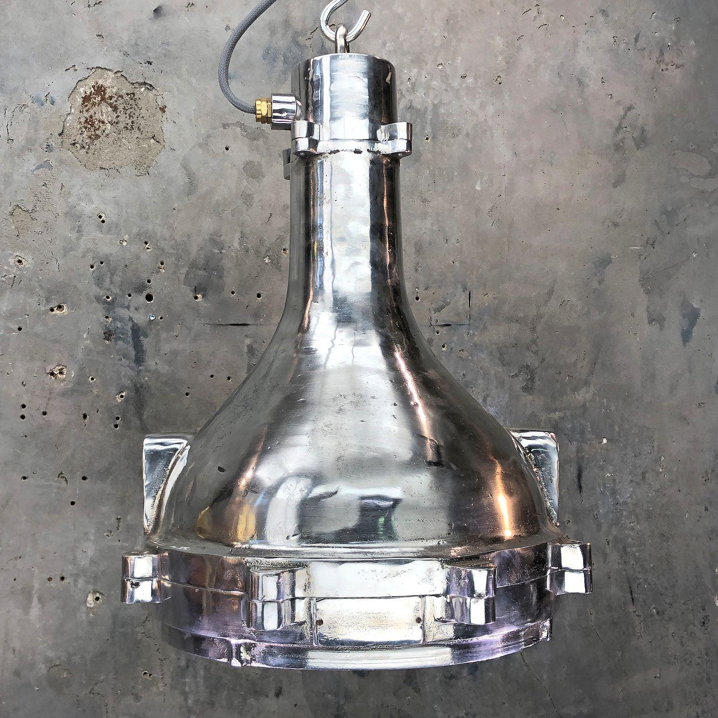 1980s aluminum industrial engine room ceiling pendant with tempered glass cover. Reclaimed from decommissioned ships and professionally restored by Loomlight in UK ready for modern interiors.

Rated: IP55
Weight: 18kg

All lights are