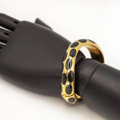 1980s Angela Cummings 18K Yellow Gold Black Jade Inlay Wave Bangle
