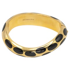 1980s Angela Cummings 18K Yellow Gold Black Jade Inlay Wave Bangle