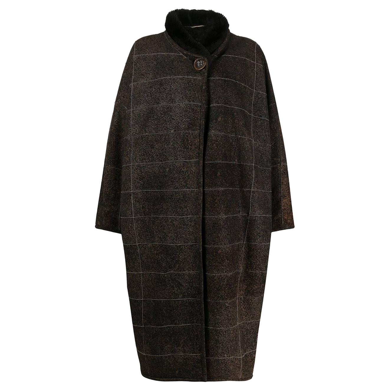 1980s A.N.G.E.L.O. Vintage Cult Shearling Cape For Sale at 1stDibs