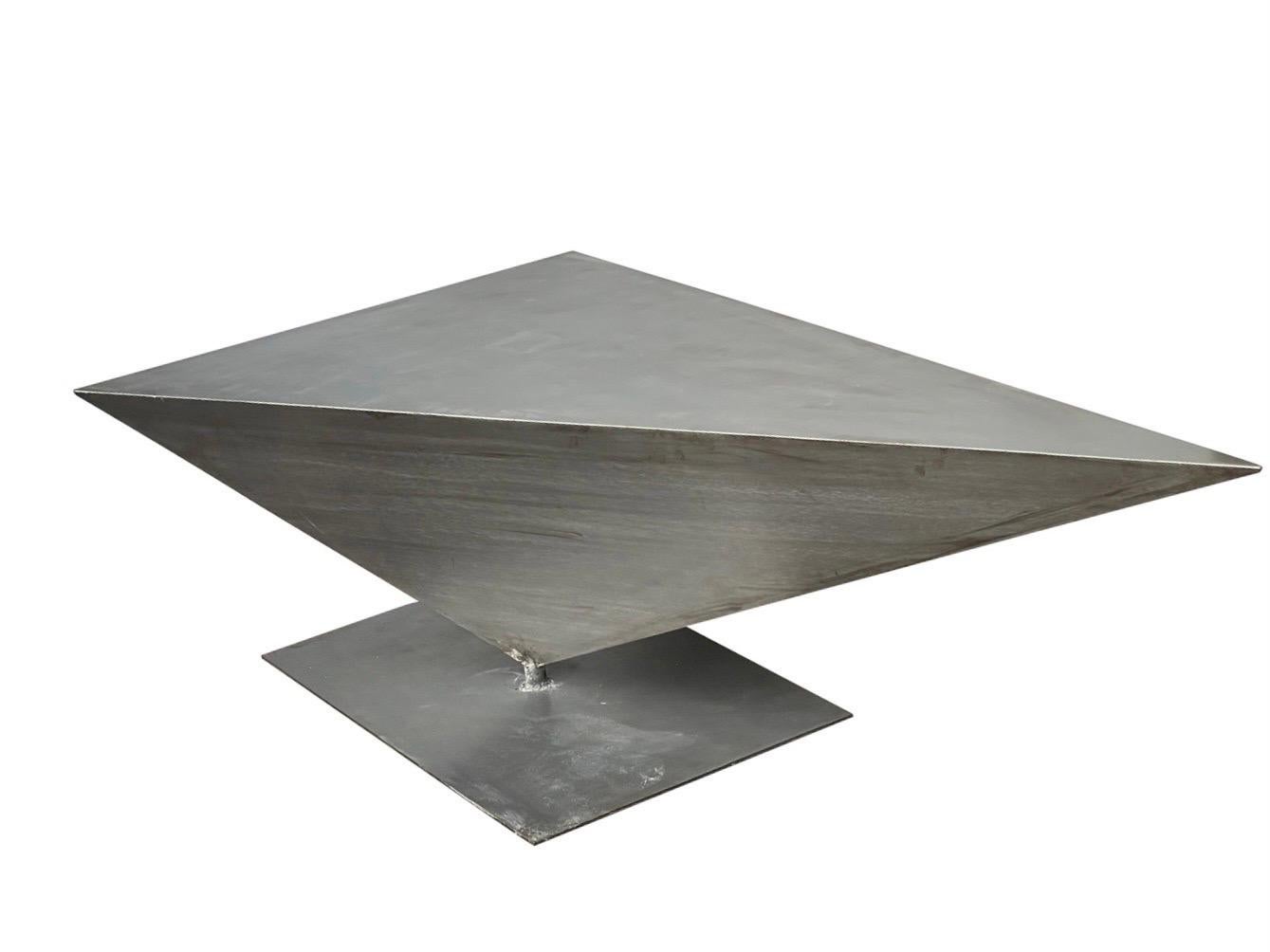 Very unique one-of-a-kind angular sculptured metal table was purchased in Miami from a sculptor in the 1980s no signature