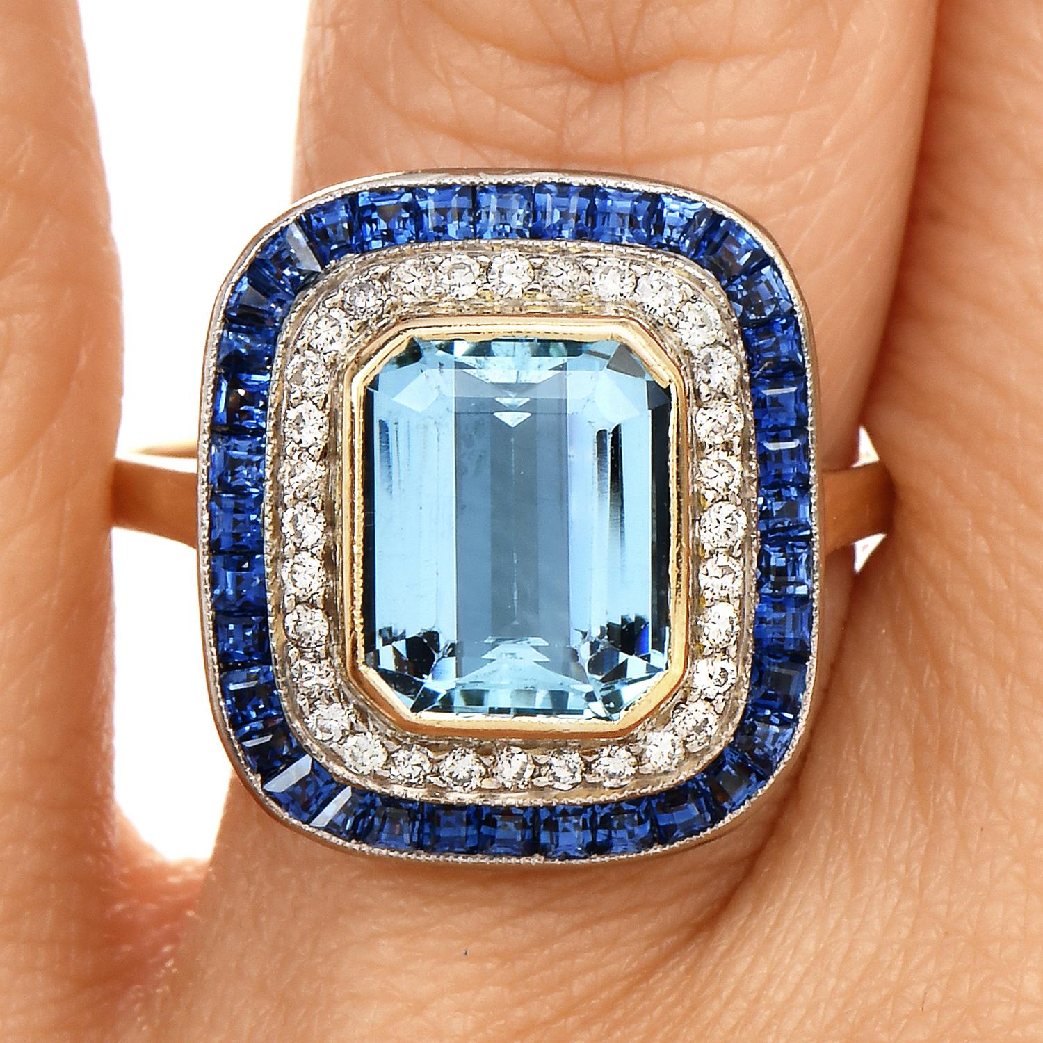Ready for an Ocean Blue Birthstone Gift?

This glamorous Aquamarine diamond halo cocktail ring weighs approx. 7.7 grams and it is Crafted in 18K Yellow & White Gold. 

The center exposes a genuine emerald cut Ocean Blue Aquamarine, bezel set,