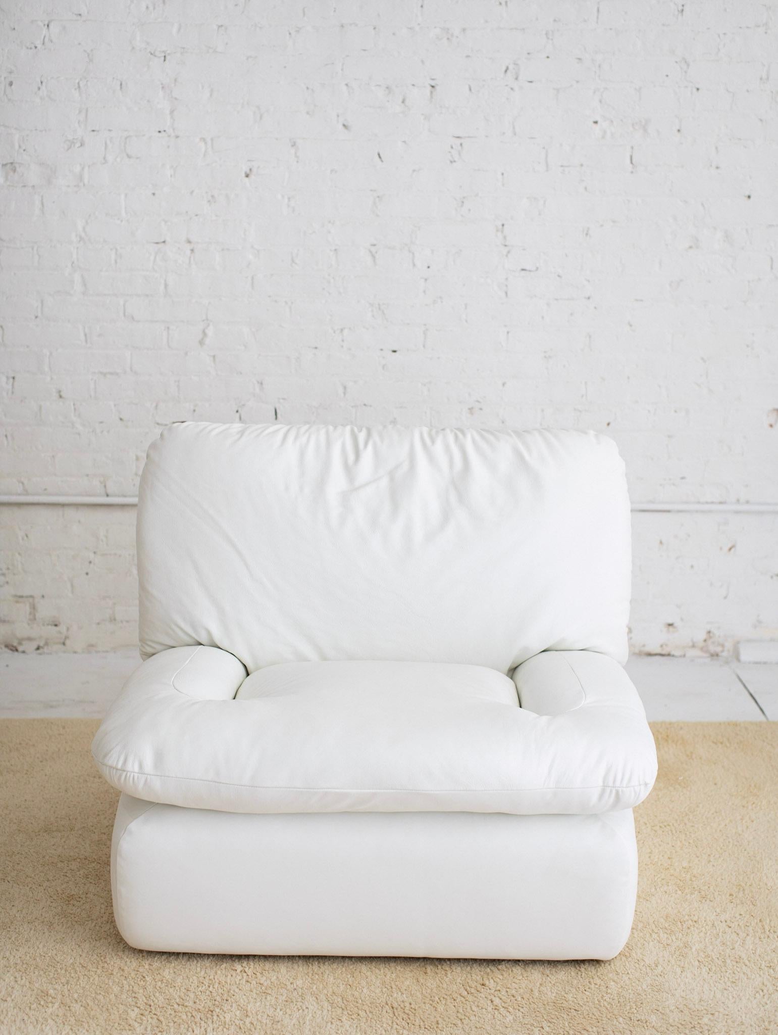 white leather oversized chair
