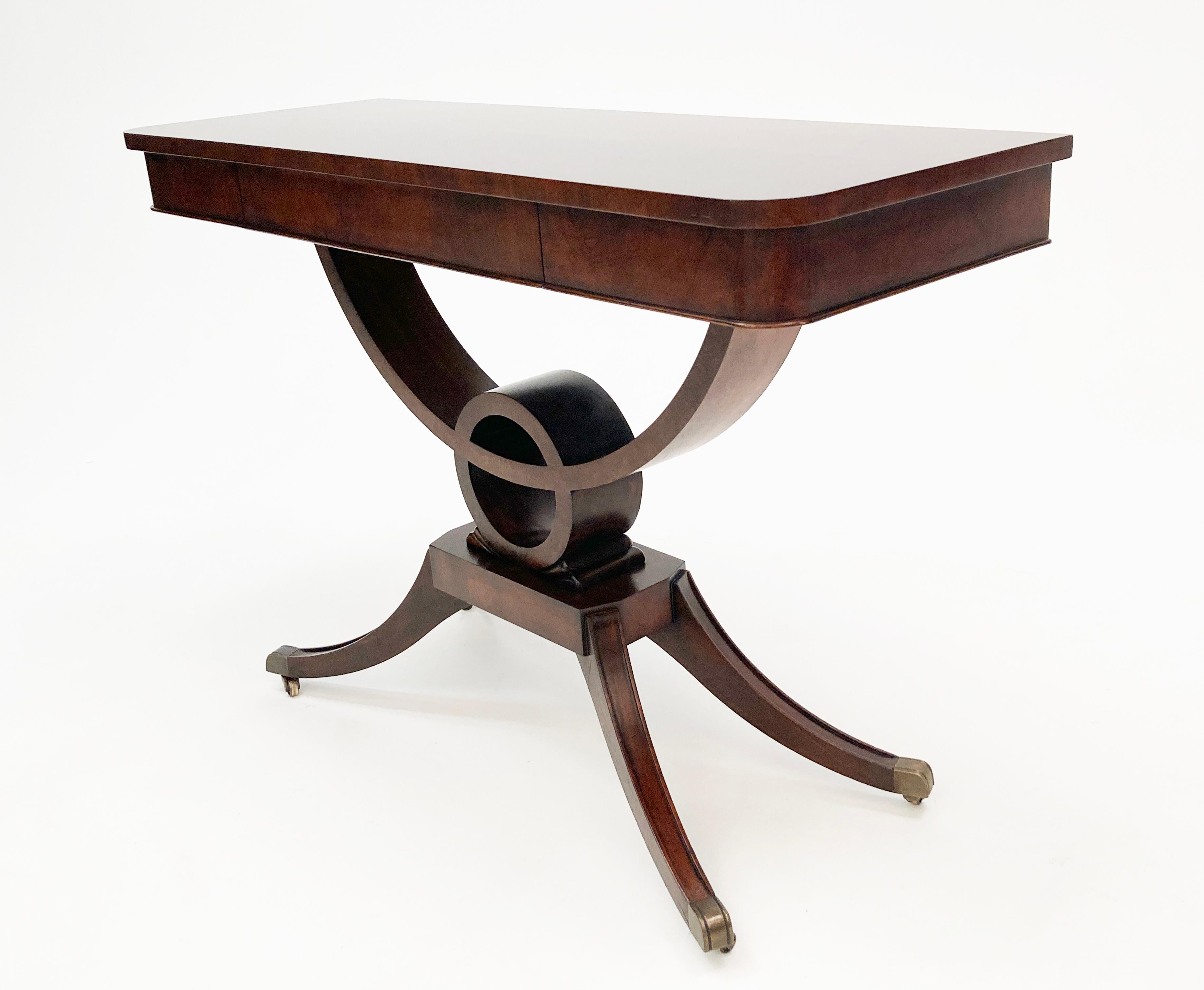 The more I see this piece, the more in love with it I become. From the beautiful curves to the richness of the tiger-wood mahogany, it is simply stunning. With a single front hidden drawer, this piece is also very functional! This table design