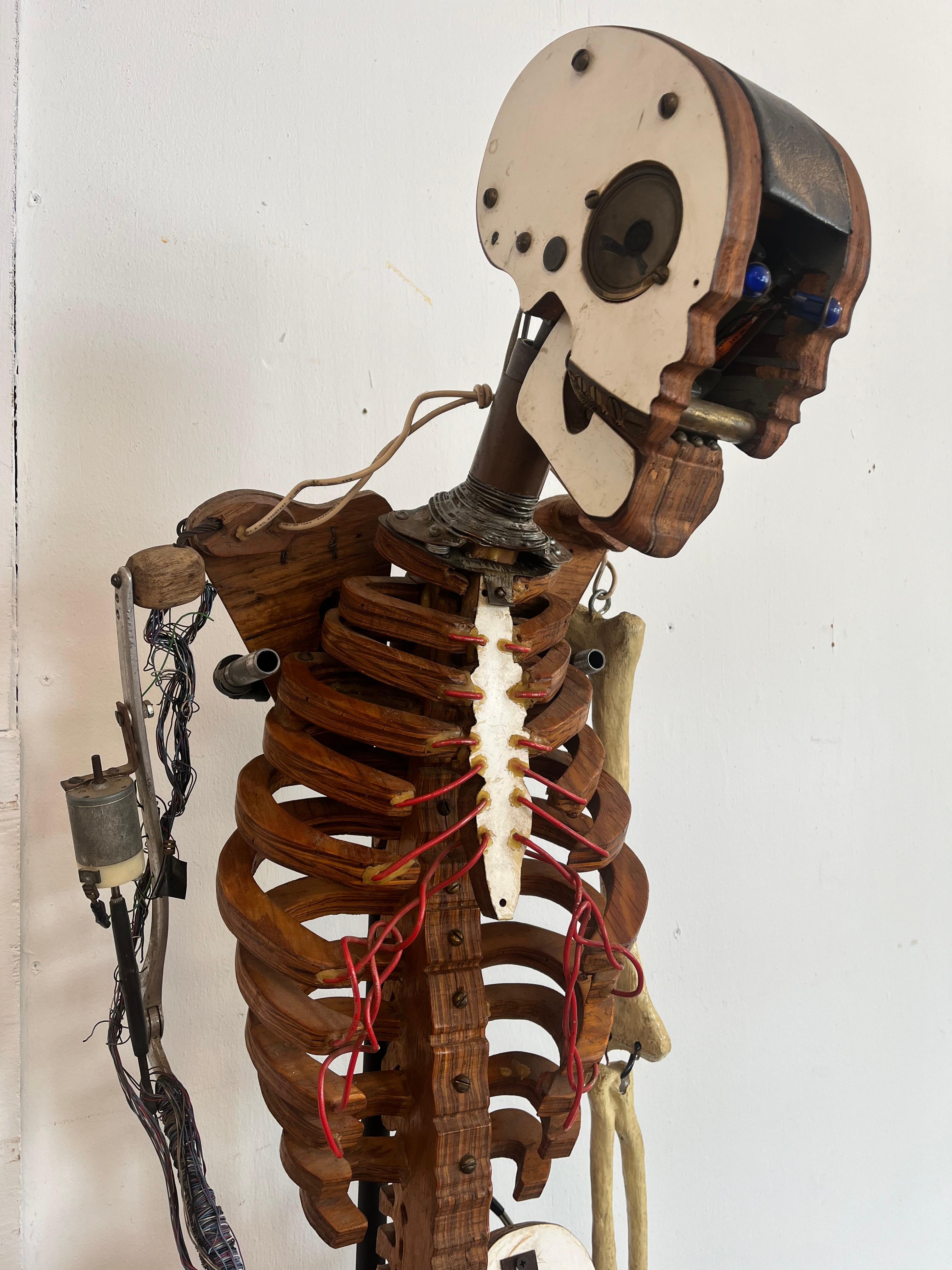 1980’s Artist Made Found Object Carved Wood and Electronic Sculptural Skeleton In Good Condition For Sale In Atlanta, GA
