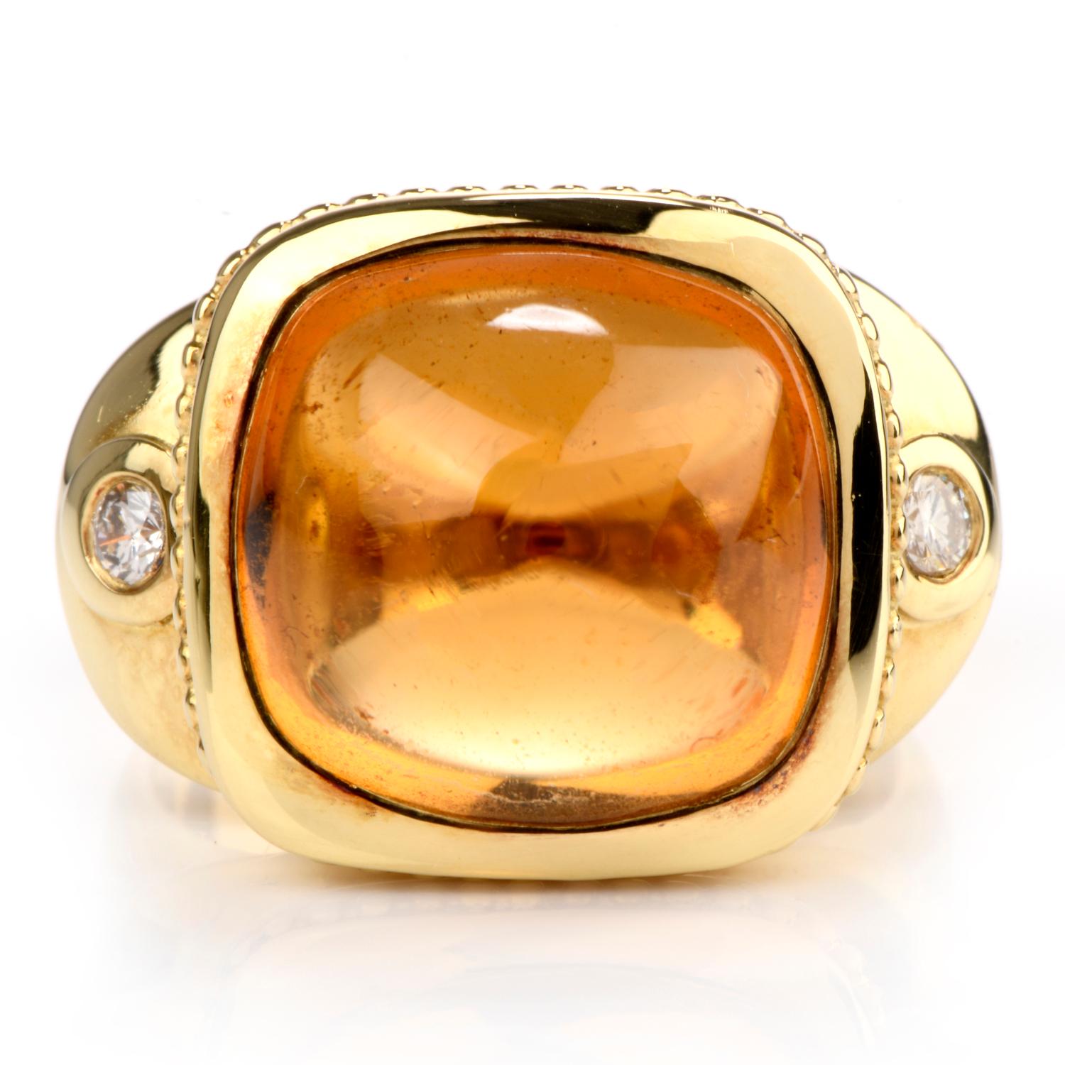 A bold statement is made with this DIamond and Citrine

cocktail ring crafted in 18K yellow gold.

Adorning the center is one large cabachon cut Citrine measuring

appx. 13.90 x 1305 x 8.88mm high and weighing appx. 14.53 carats.

Flanked on either