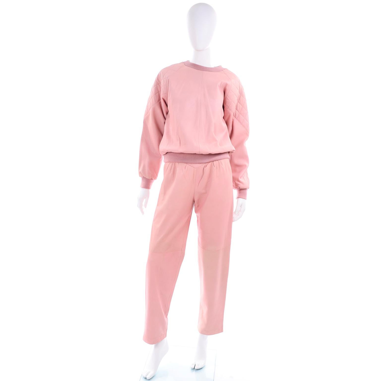 This gorgeous ultra soft pink 100% Genuine Leather two piece outfit includes a high waisted pair of pants and a sweatshirt style pullover top. This is the best athleisure outfit for someone who still wants high style this Spring and Summer! The top