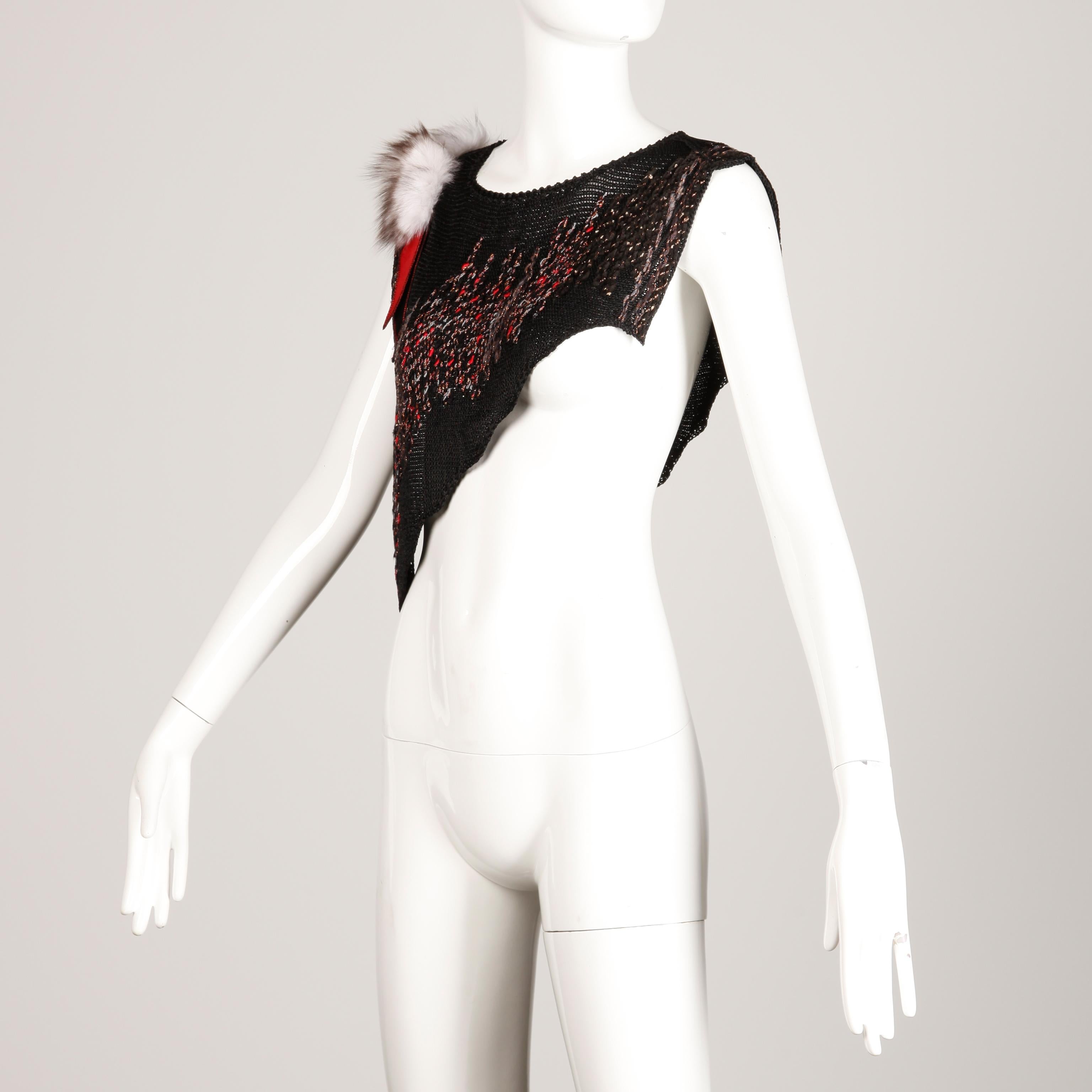 Unique 1980s vintage red and black knit shimmery metallic top, collar or layering piece with a fox fur detail on one shoulder. Asymmetric cut and open sides. The marked size is medium but this will fit most sizes small-large on account of it's free