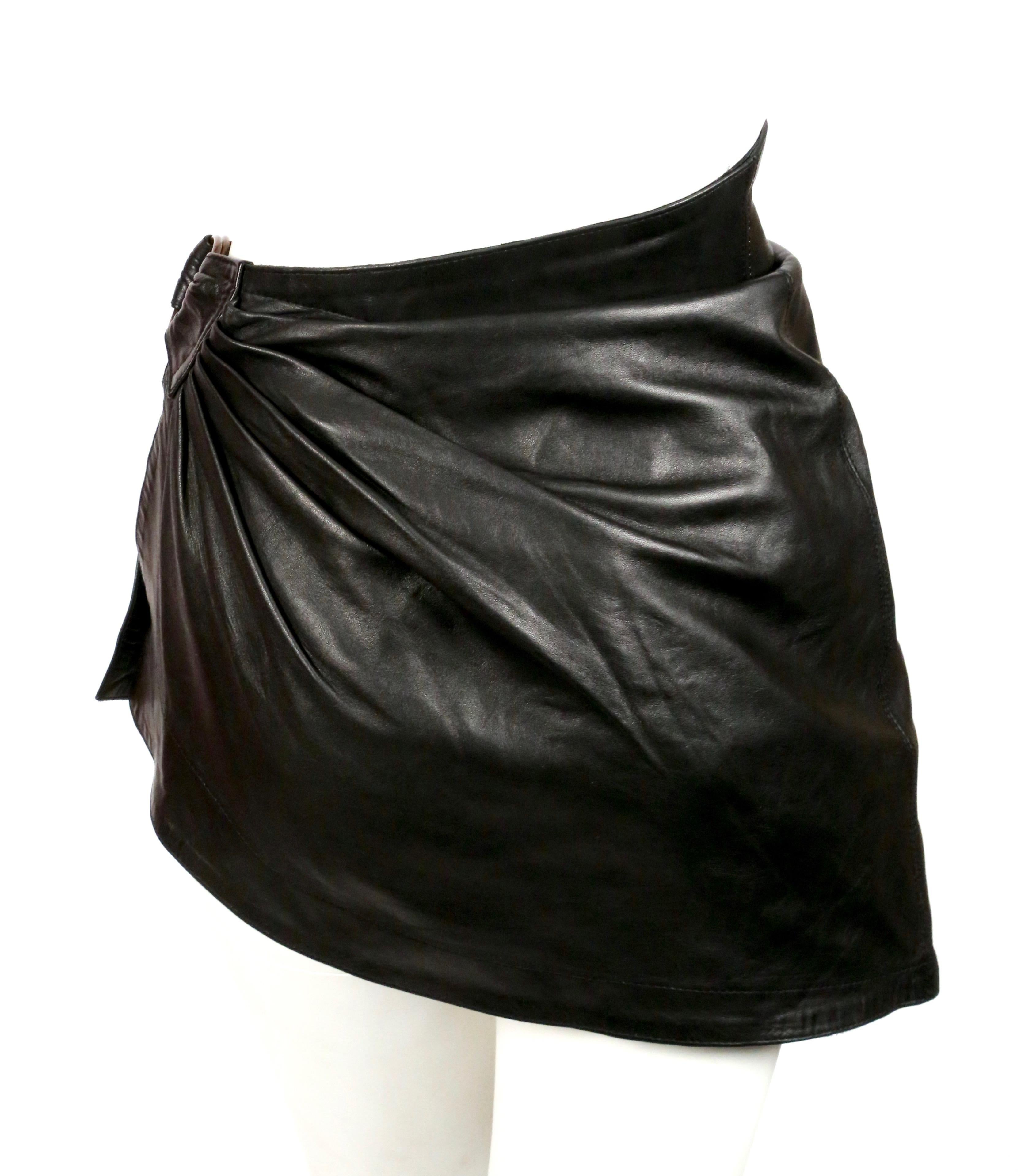 Women's or Men's 1980's AZZEDINE ALAIA draped black mini skirt with side buckle