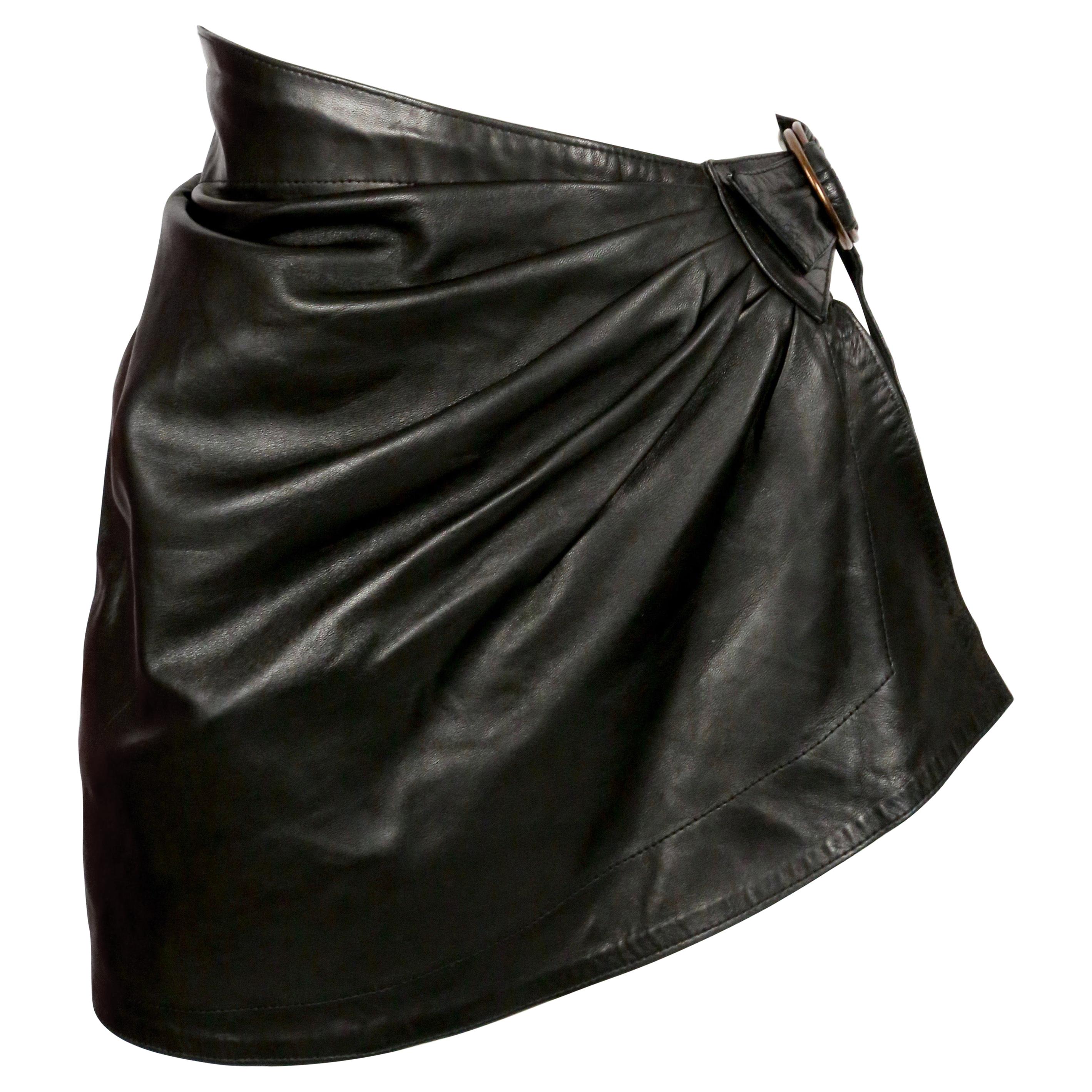 1980
s AZZEDINE ALAIA draped black mini skirt with side buckle