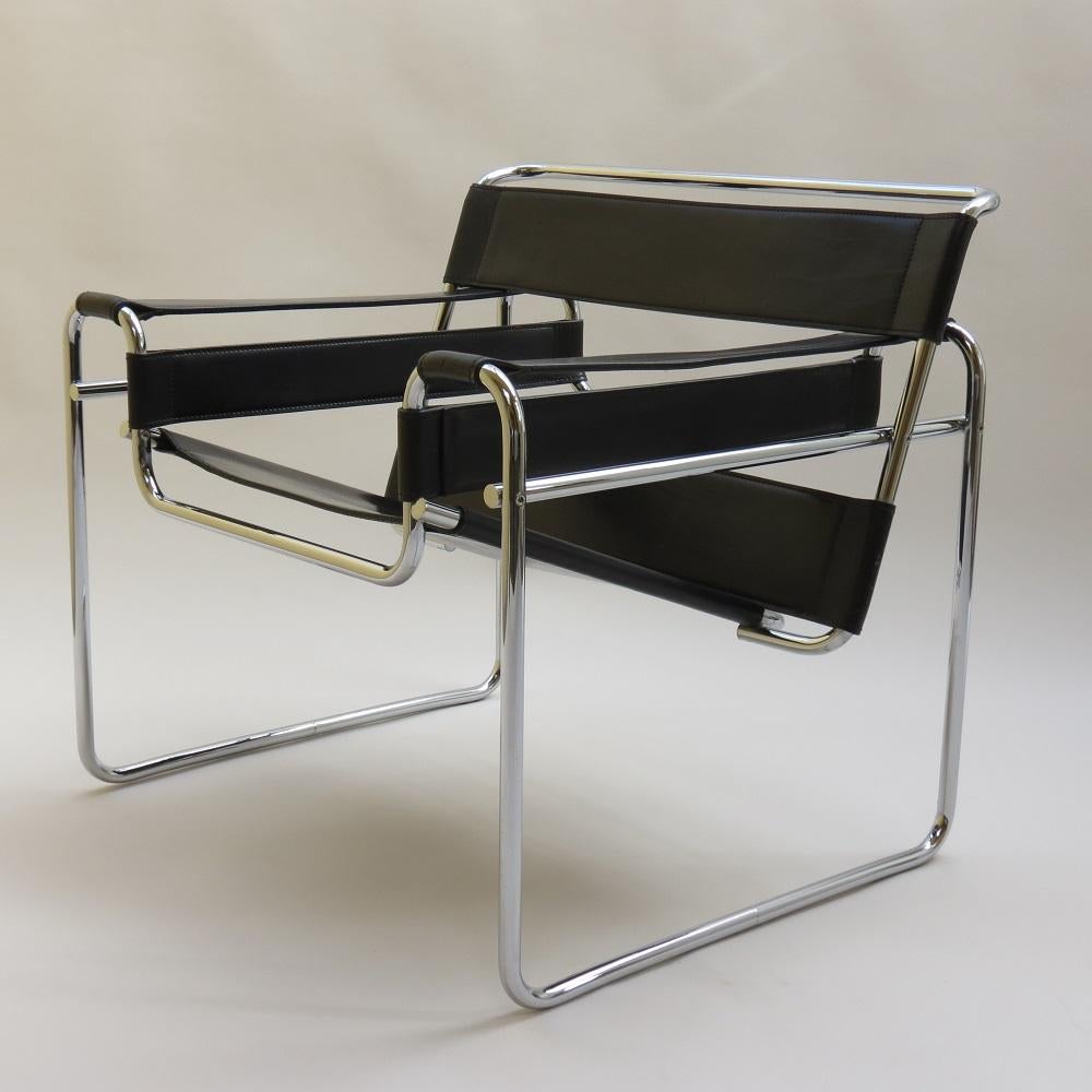 Wassily armchair in black leather, designed by Marcel Breuer and manufactured by Fasem, Italy in the 1980s, original year of design 1925. The chair is stamped to the underside Fasem 11-83, and dates from November 1983. 
Very good quality production