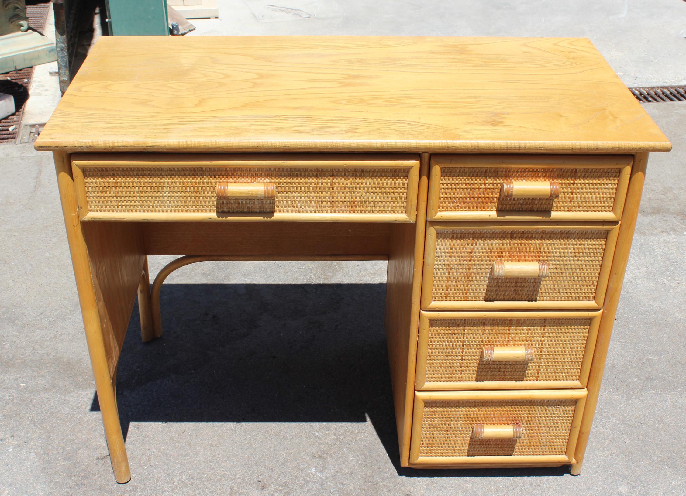 1980s bamboo and rattan desk with drawers.
