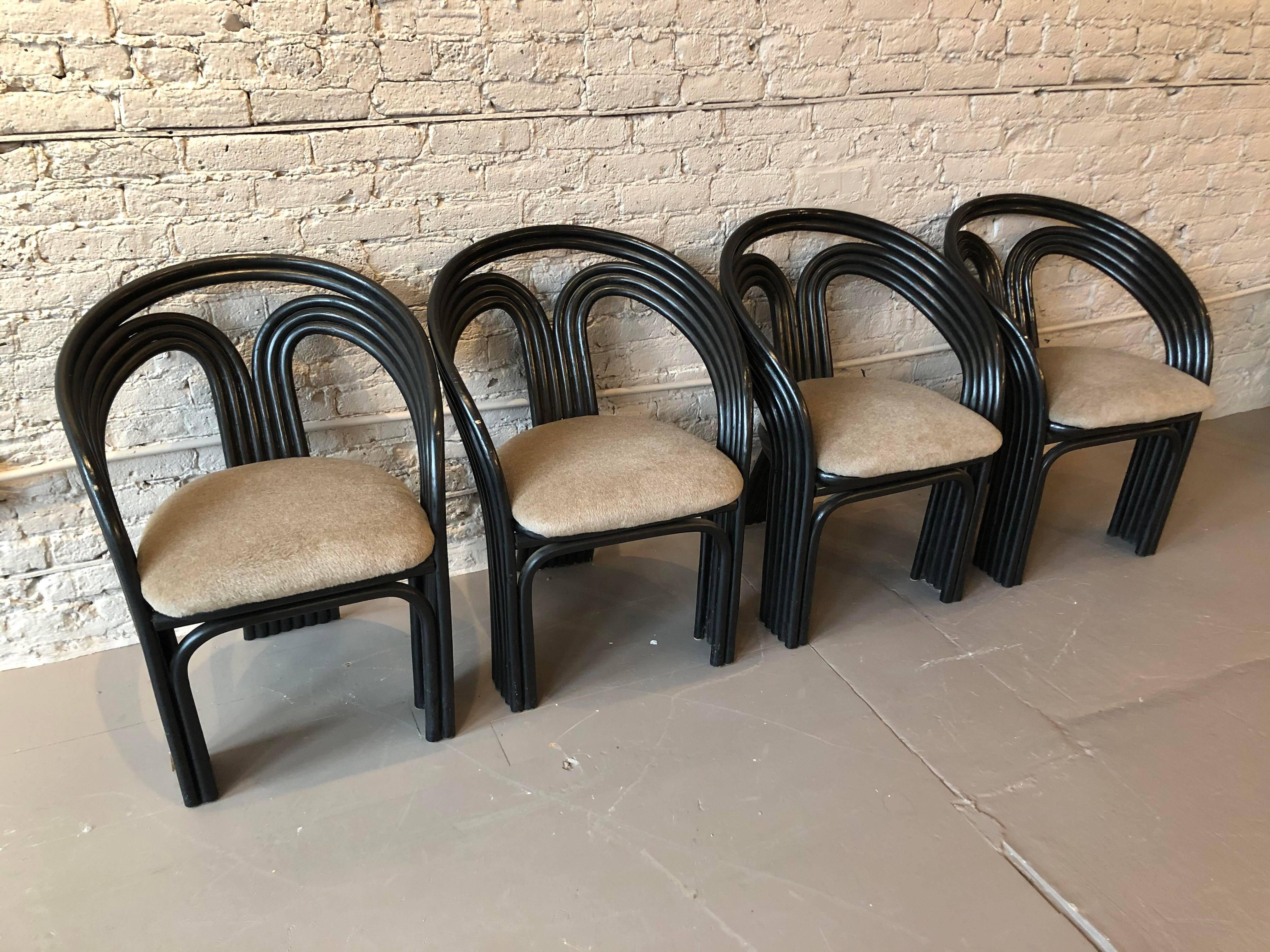 1980s Bamboo dining chairs in the manner of Axel Enthoven for Rohe Noordwoolde - Set of 4

Beautiful sculptural and comfortable! Restored in taupe plush mohair. The curved back is so relaxing to spend hours in. No labels - but believed to be Rohe.