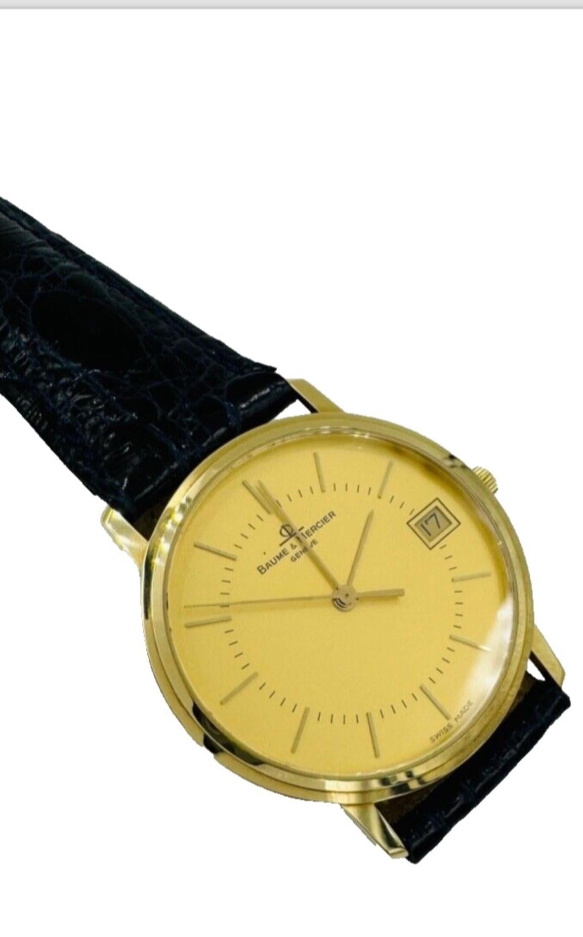 1980s Baume & Mercier Yellow Gold Wristwatch.

  This 1980s Baume & Mercier Yellow Gold Wristwatch is another classic watch from the period. It has a quartz movement with a second hand and a date.  And it has a gold dial that compliments the case