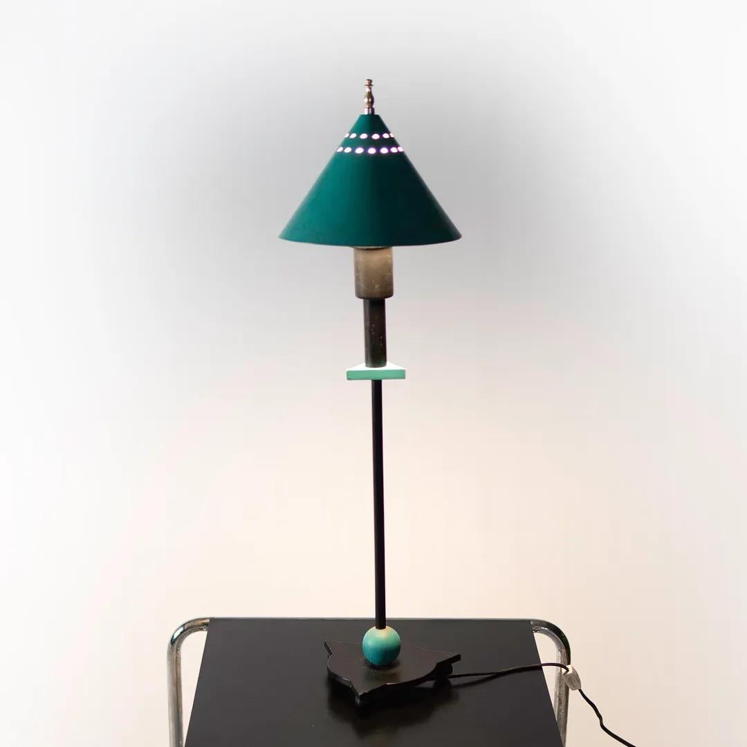 Listed for sale is a 1980s vintage BE YANG desk and table lamp in teal and black. The lamp was acquired from a Washington, D.C. area estate among other period-correct modern and postmodern pieces. The lamp functions nicely and retains a very nice