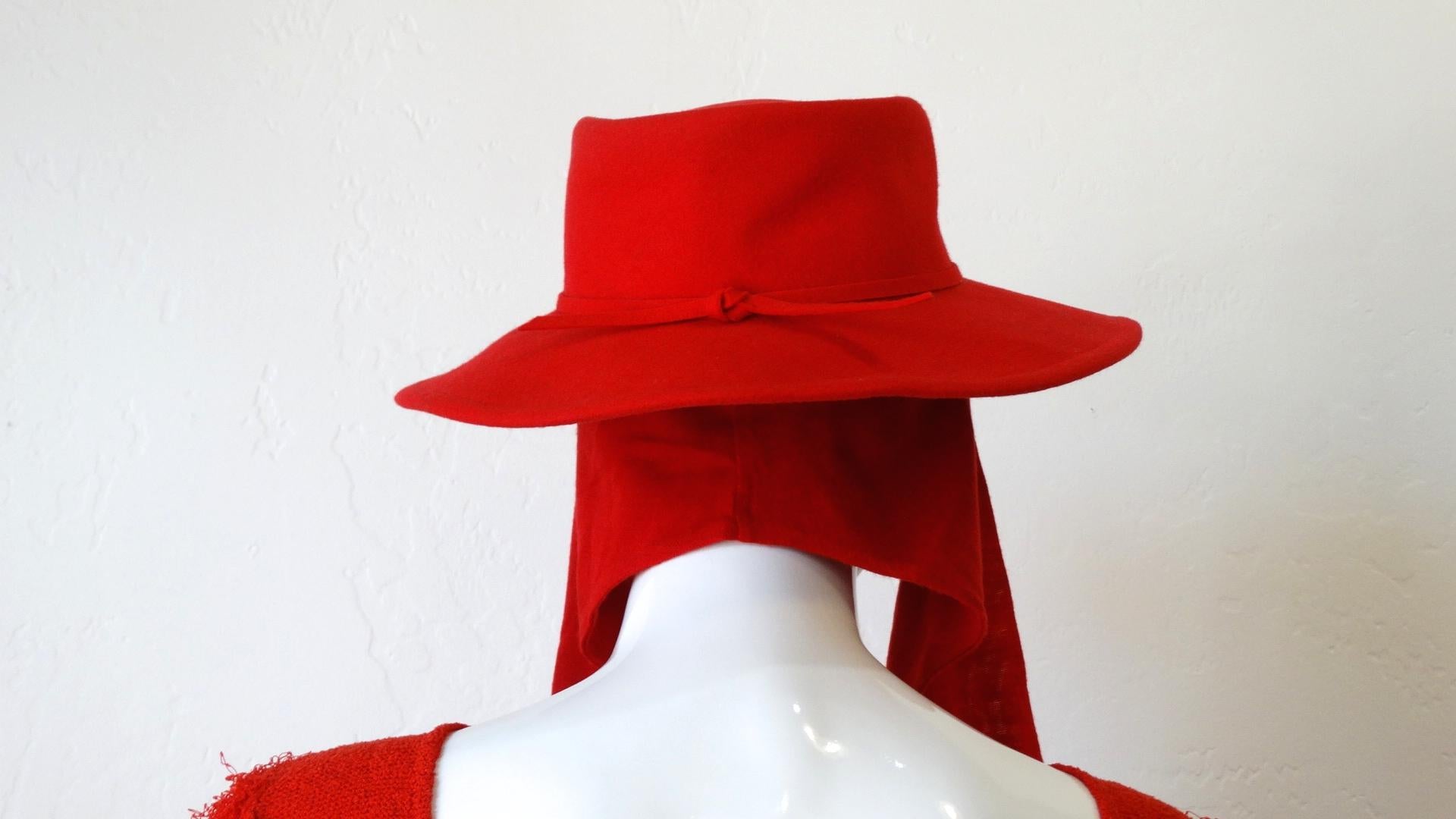 You Need This Hat In Your Wardrobe! Circa 1980s, this Betmar red boater hat is 100% Wool, and features a tonal band and a  built in head-wrap for the perfect design detail. The perfect chic hat to add a pop of color! Made in the US
**Scarf is 100%