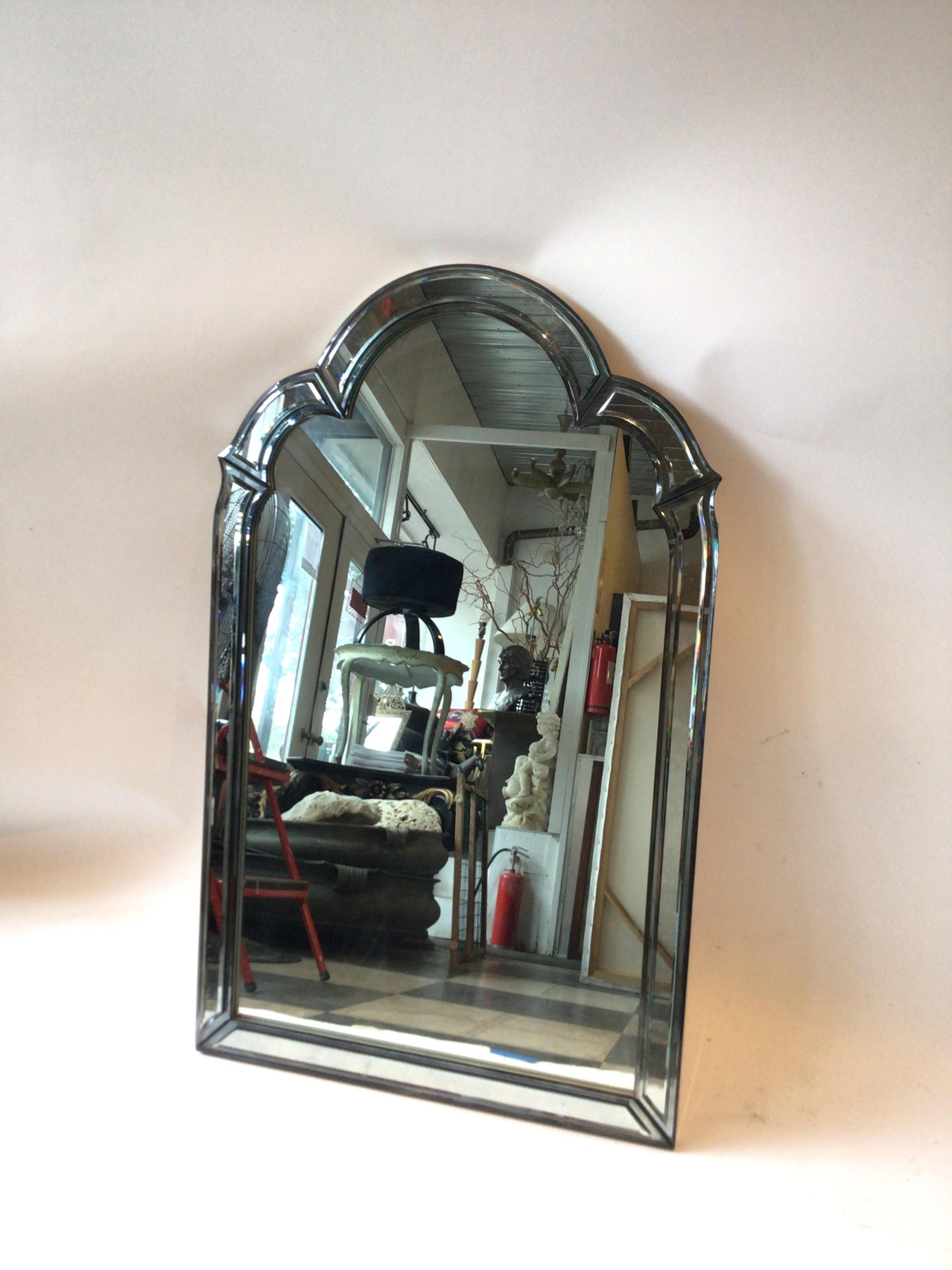 1980s Beveled arched mirror.