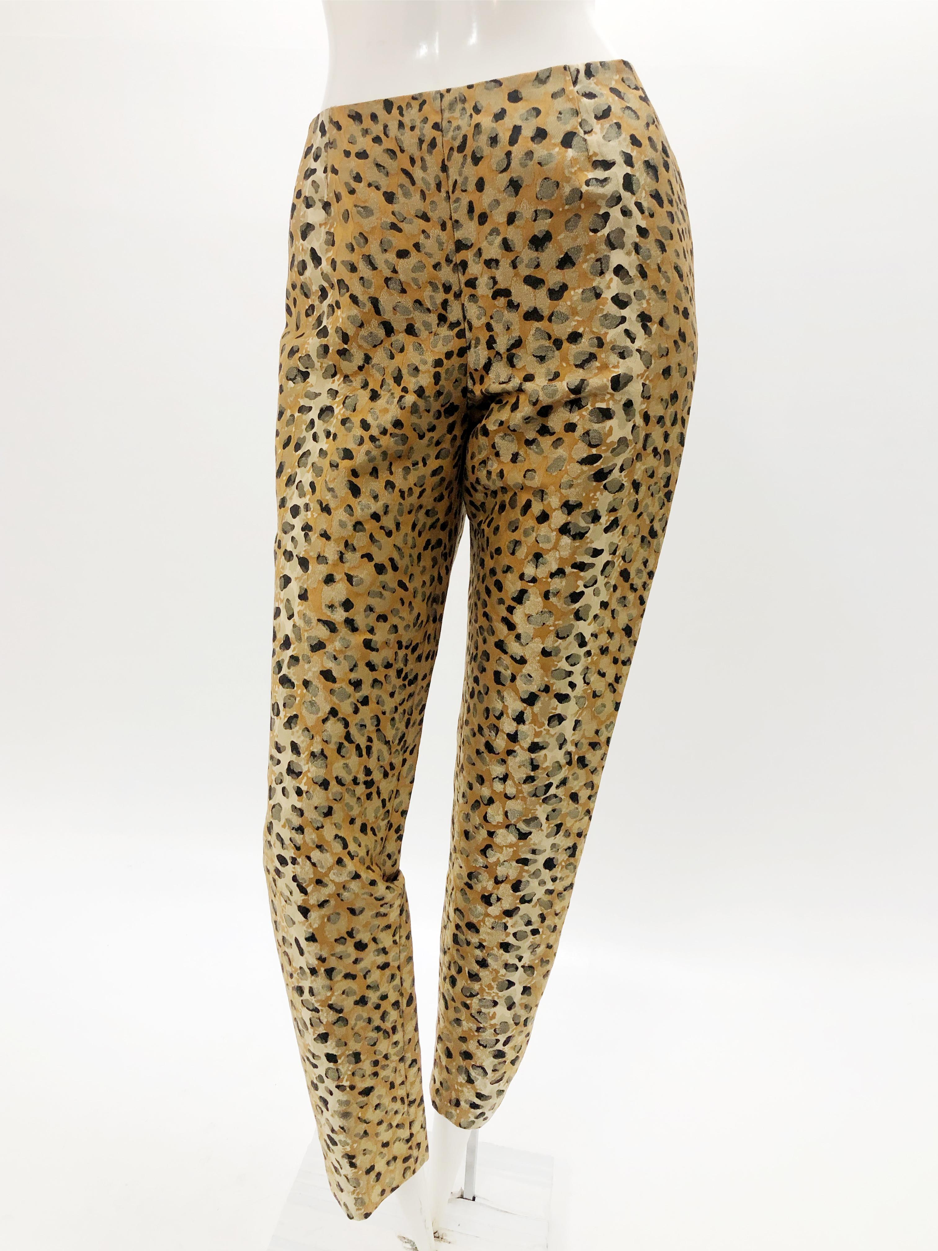 A spectacular 1980s Bill Blass leopard patterned silk lamé cigarette pant. Very fitted and lean. Center back zipper. Pants fit a US size medium/large. Escada jacket shown is sold separately.