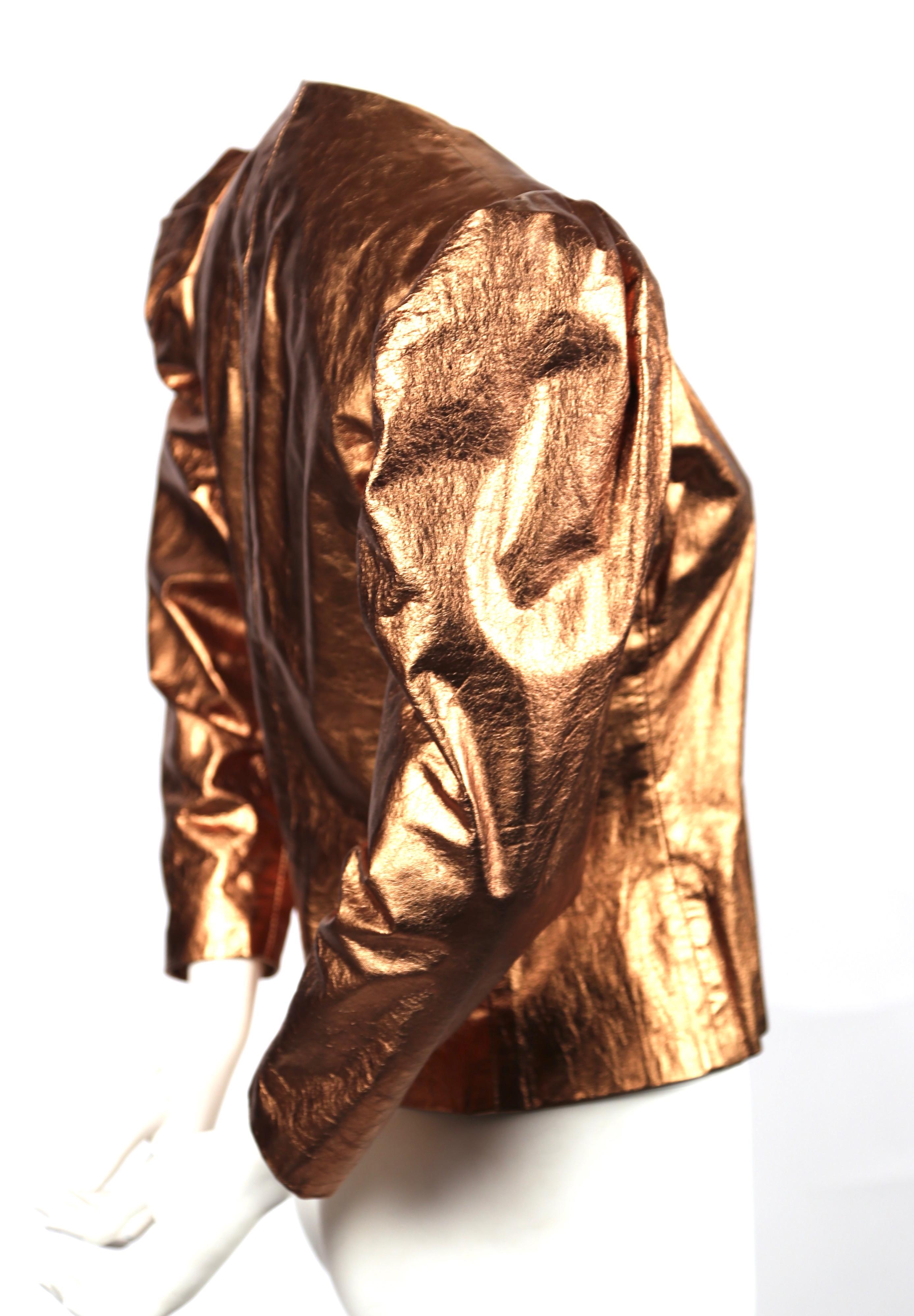 Dramatic, metallic-copper leather jacket with pleated puff sleeves designed by Bill Blass dating to the 1980's. U.S. size 4. Approximate measurements: shoulder 16