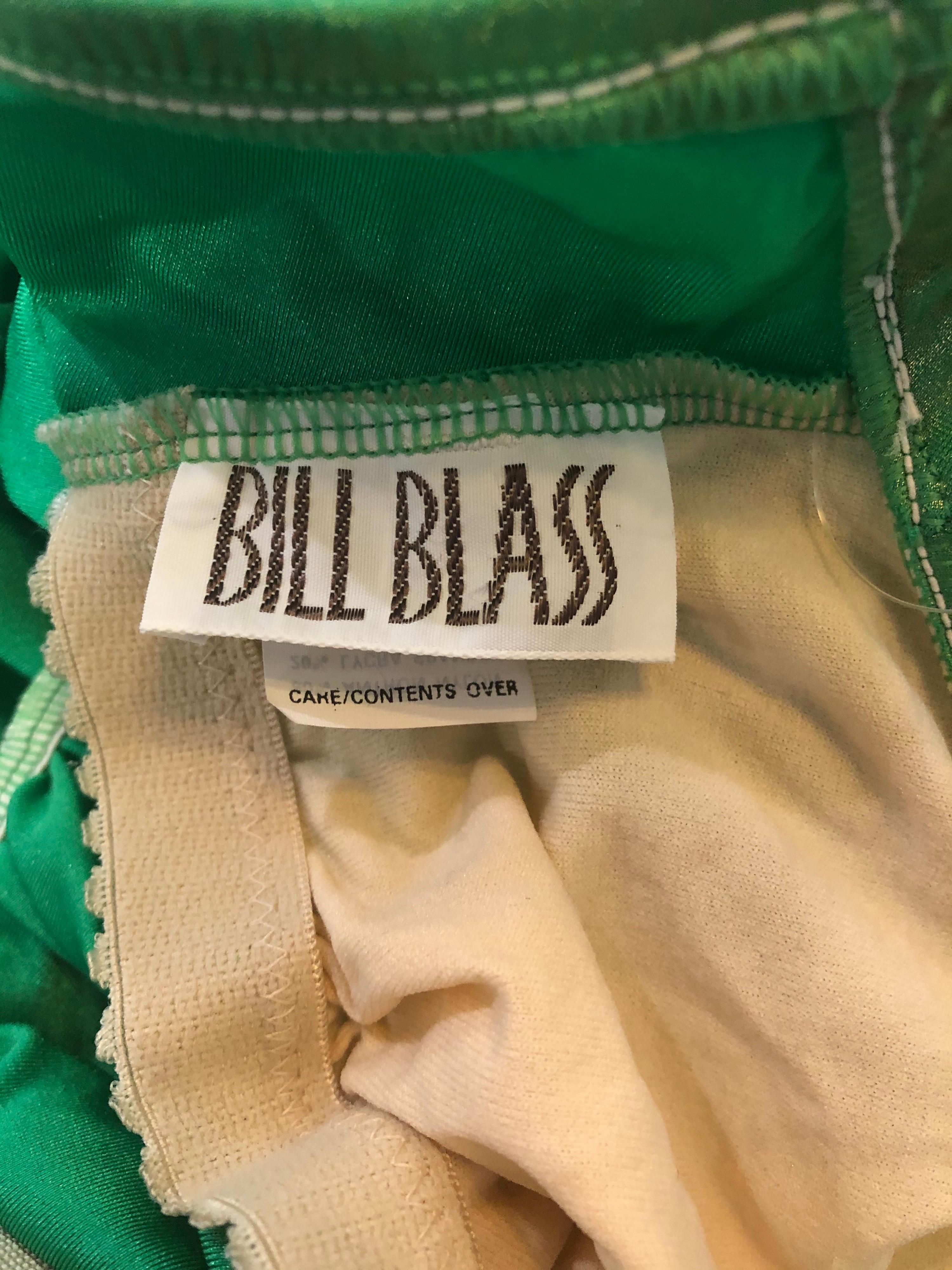 The perfect t early 80s BILL BLASS neon green metallic ruched one piece swimsuit or bodysuit ! Features flattering ruching on the front that camouflages any flaws, and a sexy low cut back. Simply slips on and stretches to fit. Built in interior